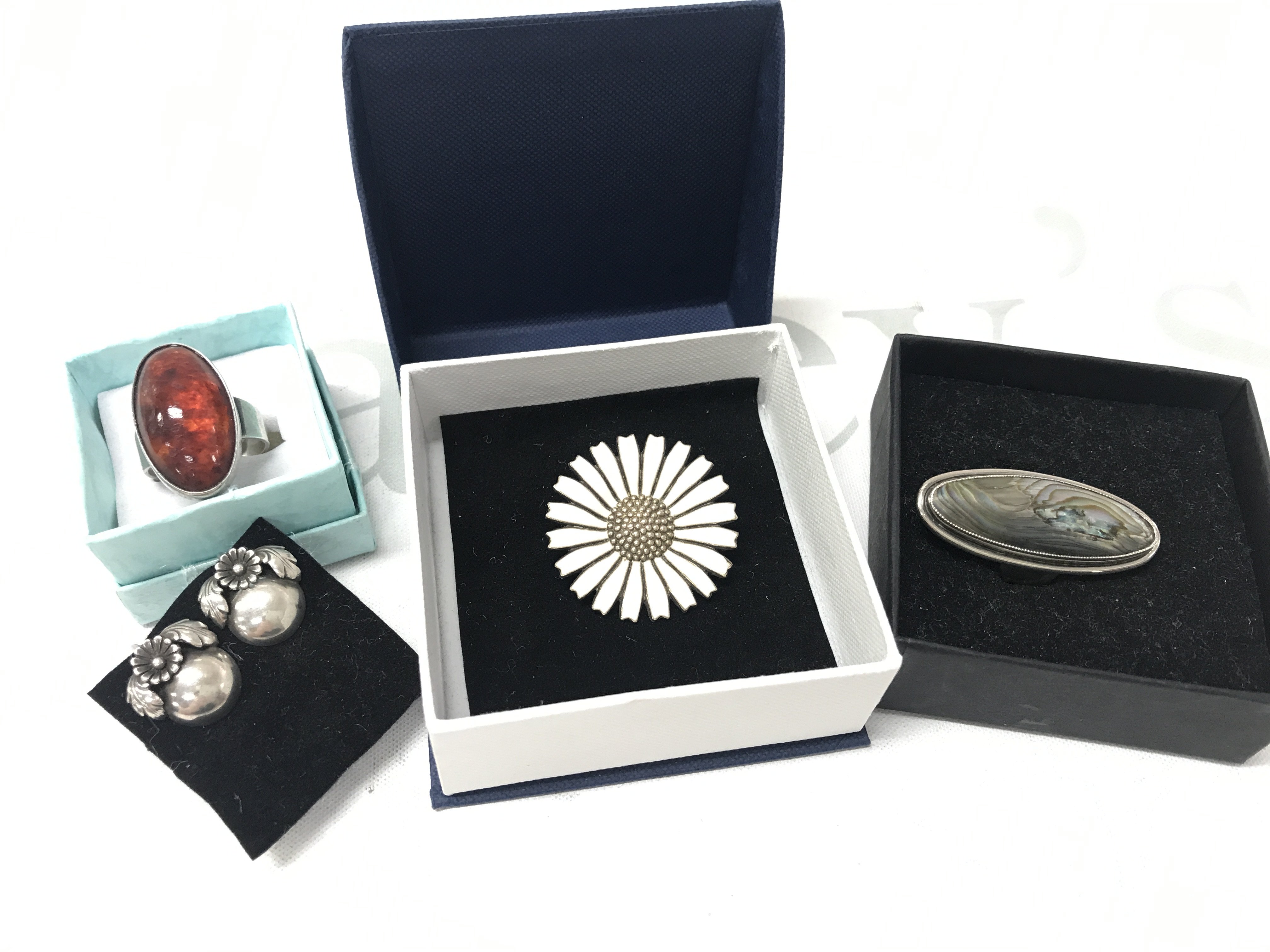 Danish silver jewellery , Niels Erik From Amber ring and earrings, Anton Michelson white enamel daisy brooch, Brodrene Bjorklund silver abalone ring. Postage catA