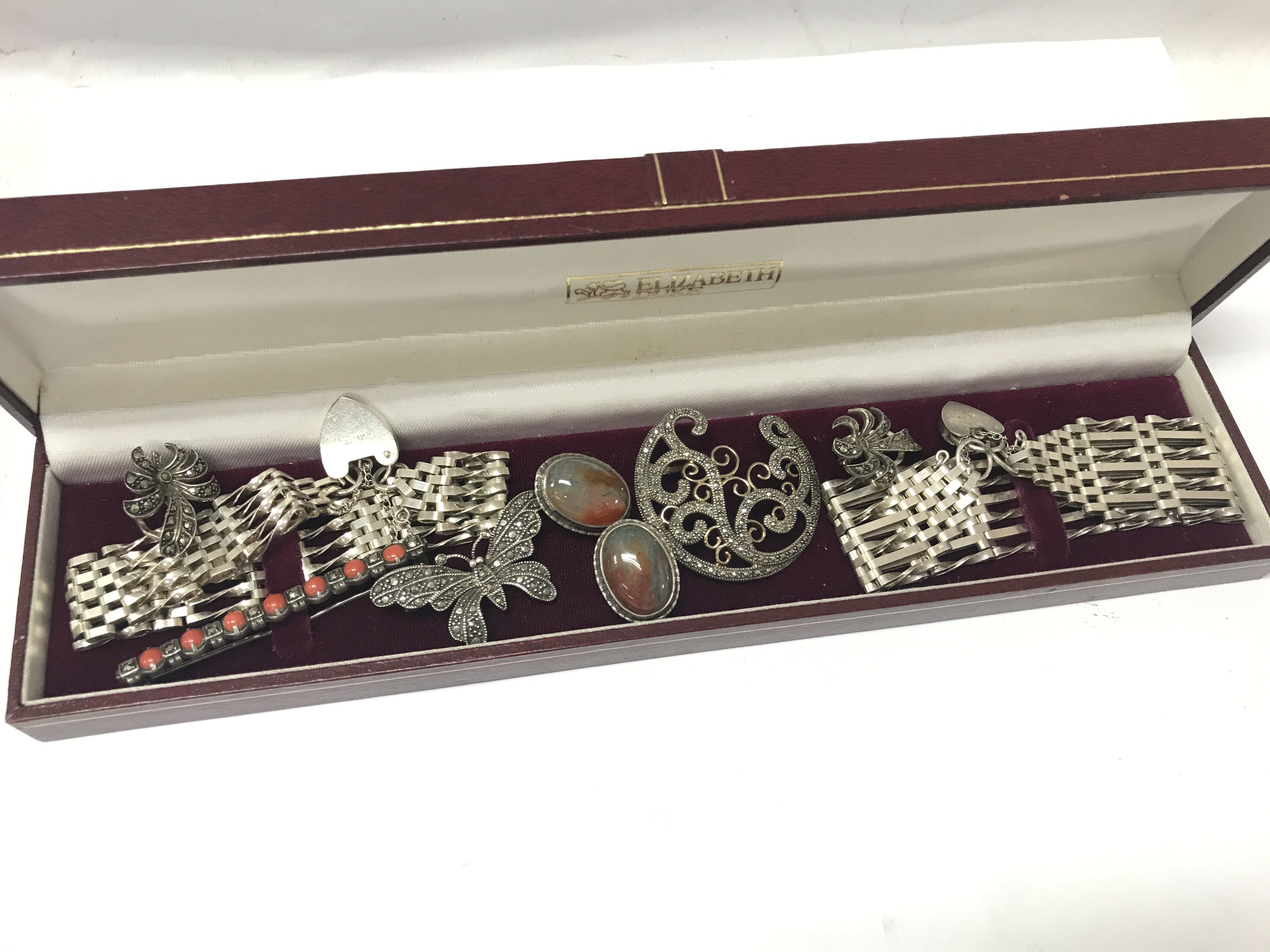 Vintage silver gate bracelets, silver marcasite brooches, silver pendant and earrings . Postage category B