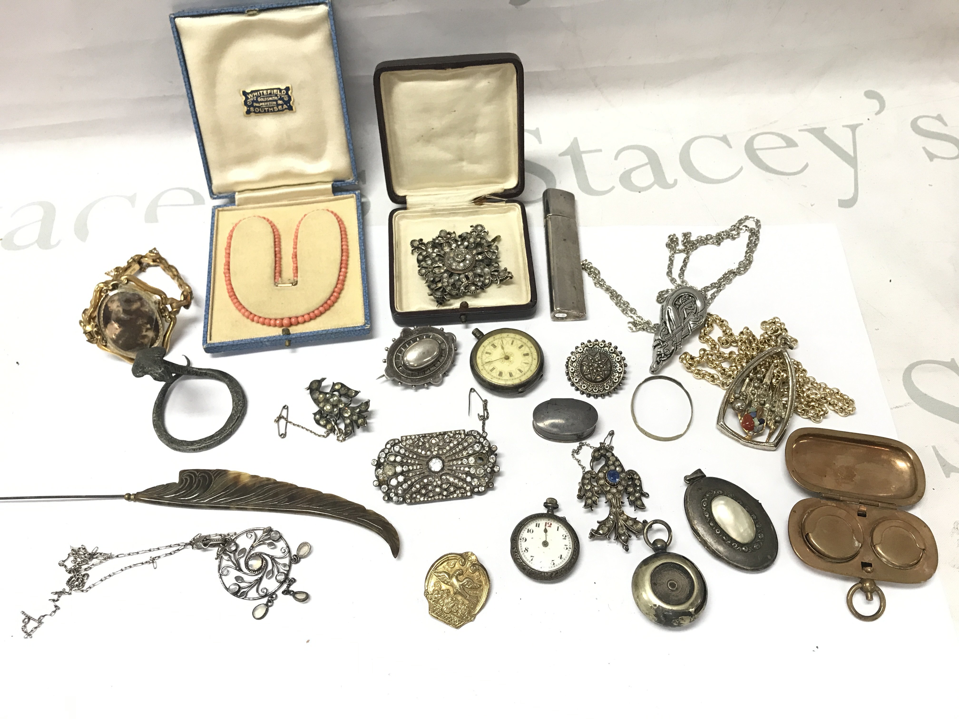 A Collection of Costume jewellery including a sovereign case, pocket watches, necklaces . Postage category B