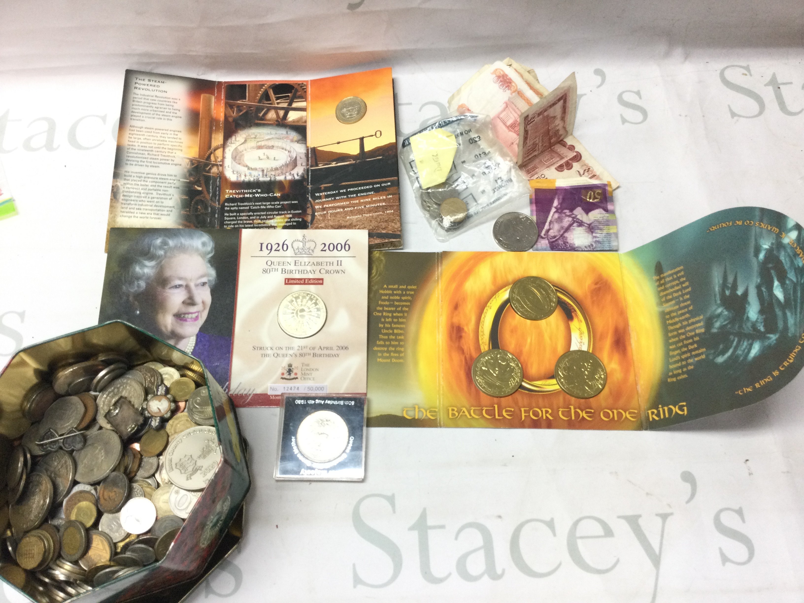 Small collection of world coinage and some commemorative coins including Lord of the rings set. Postage B