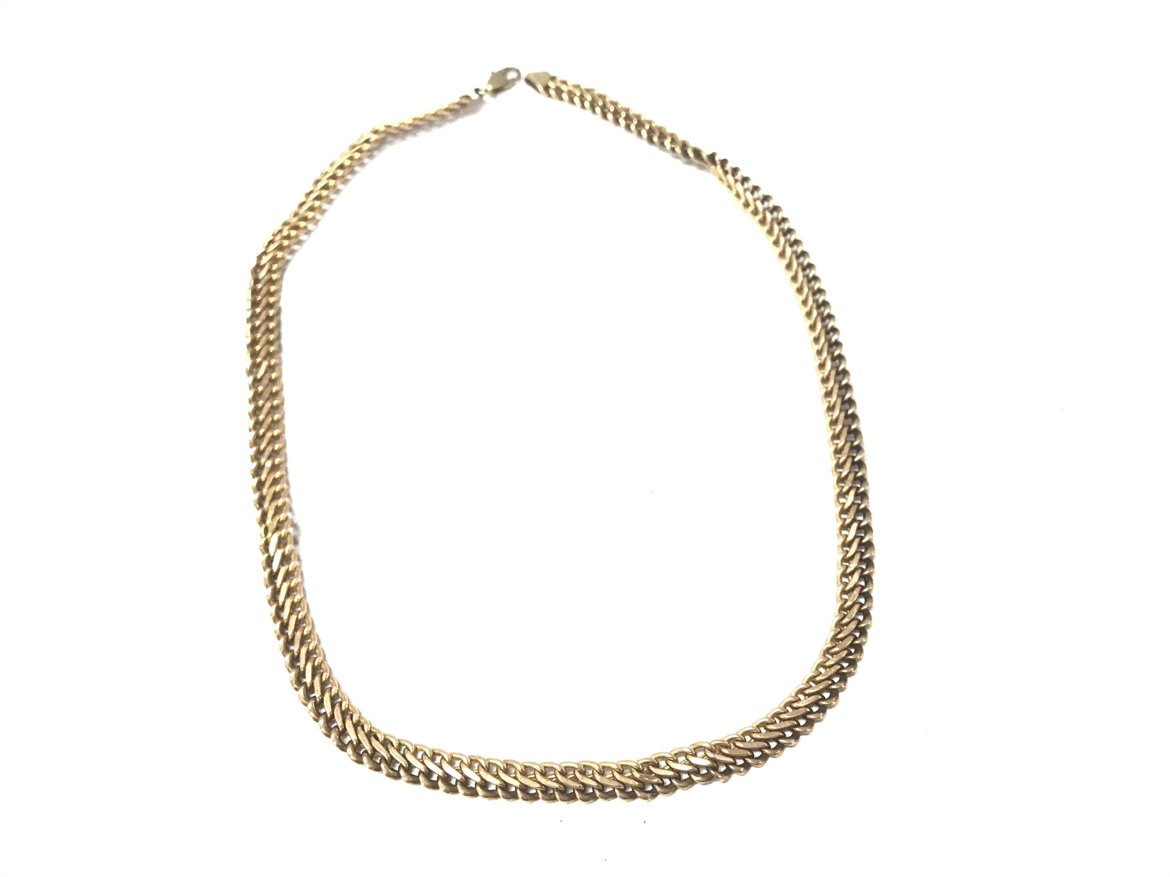 A 9ct gold chain. 12.72g Postage A