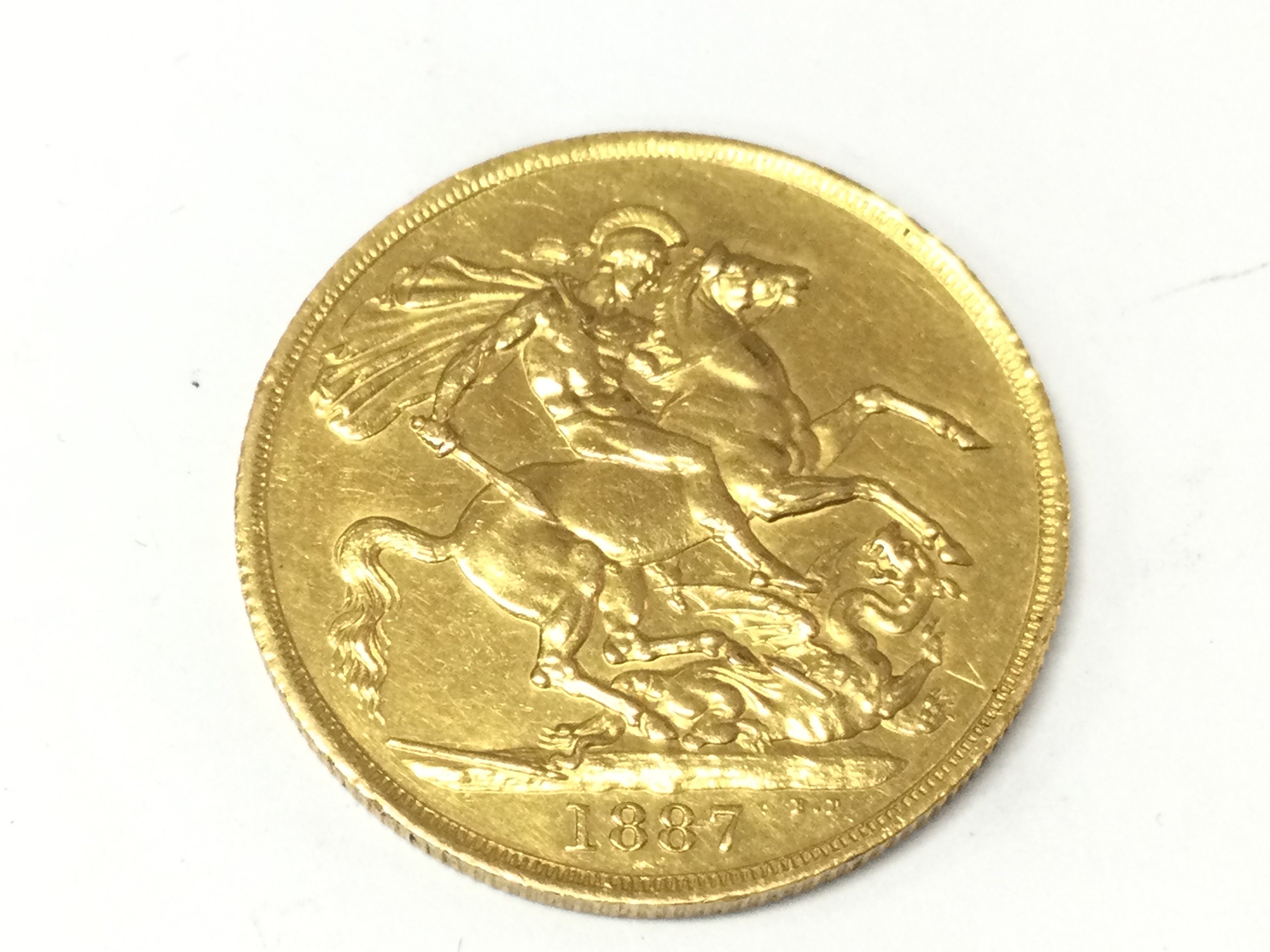 A 1887 double sovereign. Postage A