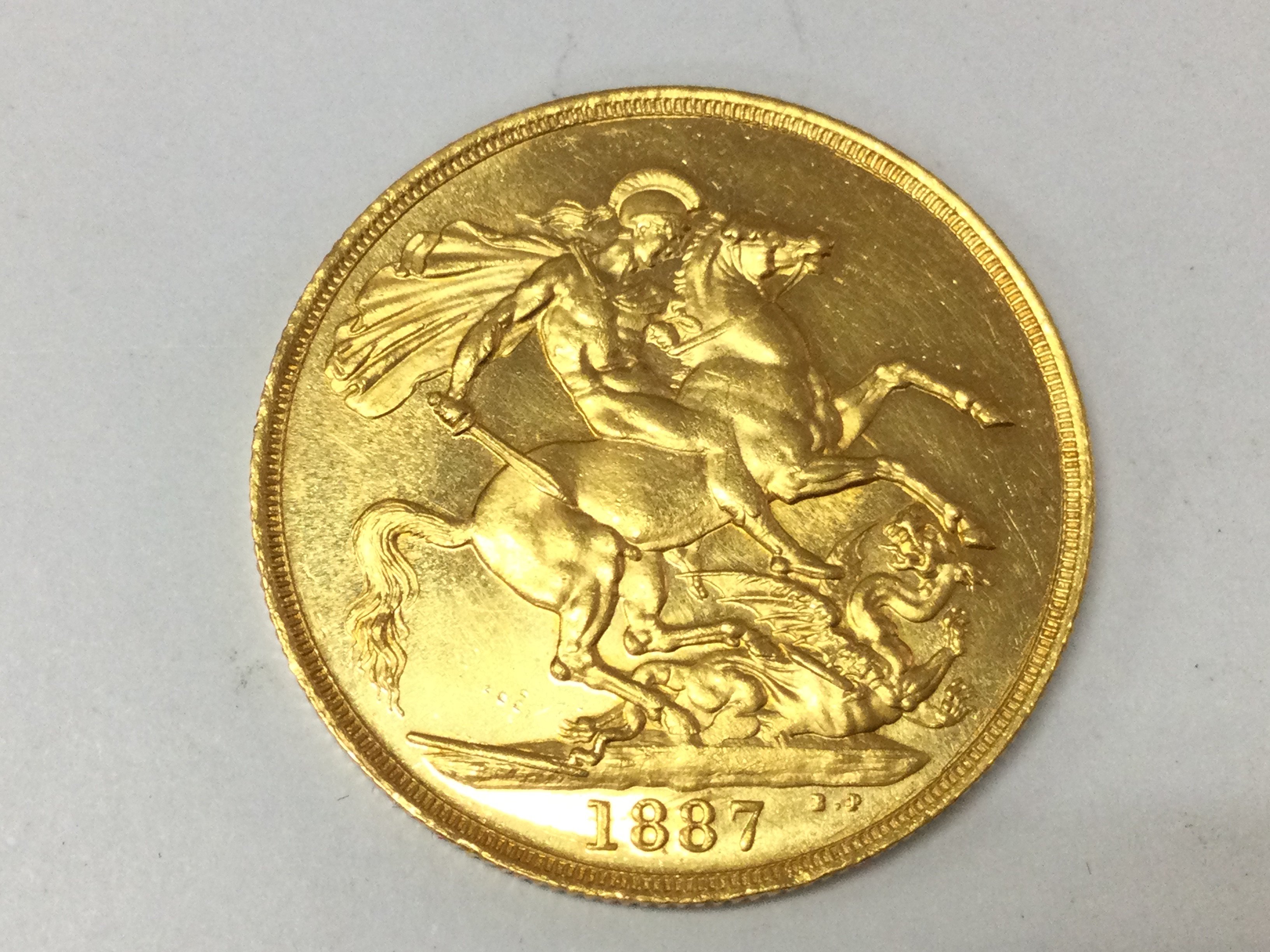 A 1887 double sovereign. Postage A