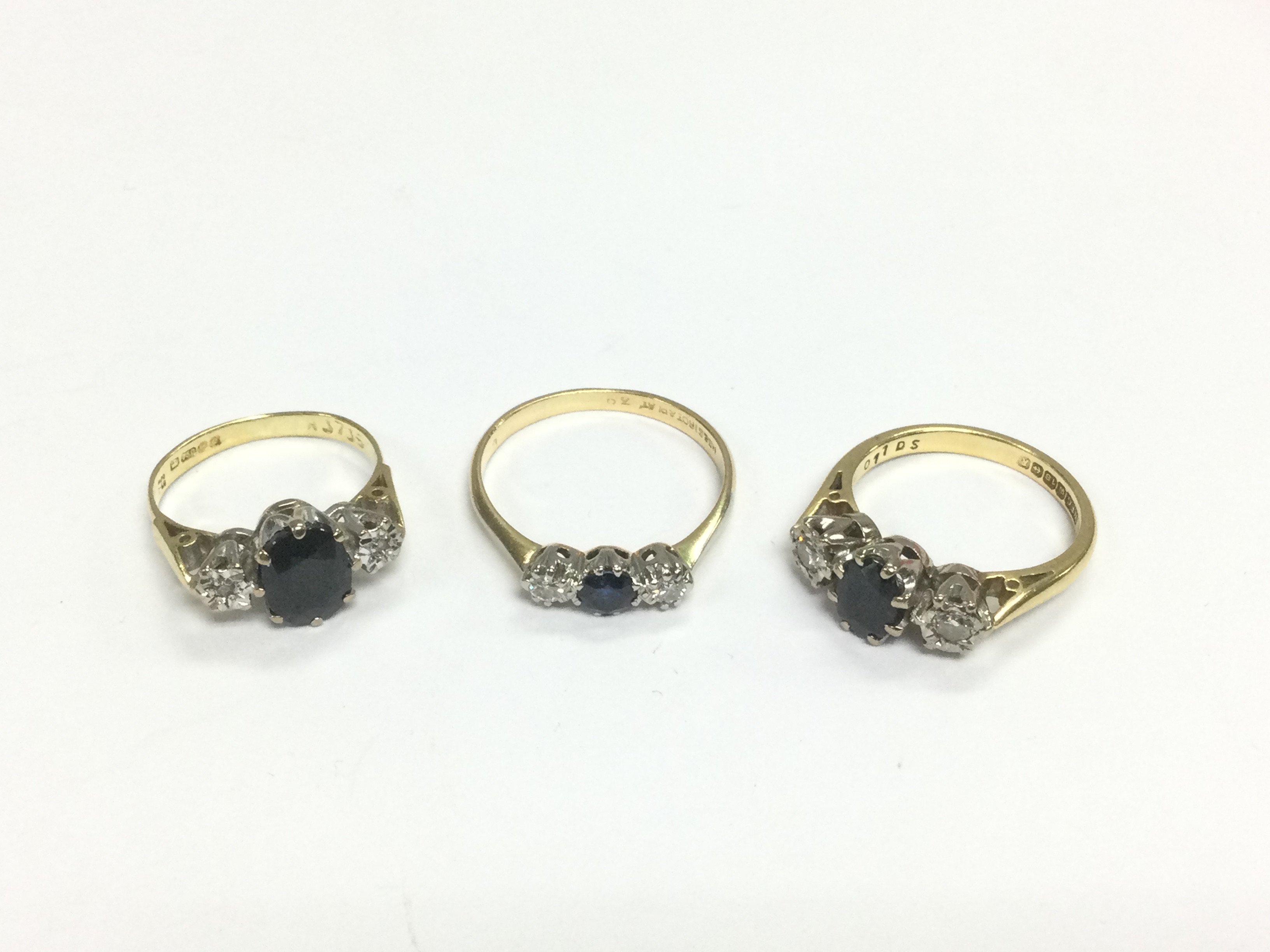 Three 18ct gold sapphire and diamond rings, approx sizes I, L and P. Total approx 10g. Shipping category A.