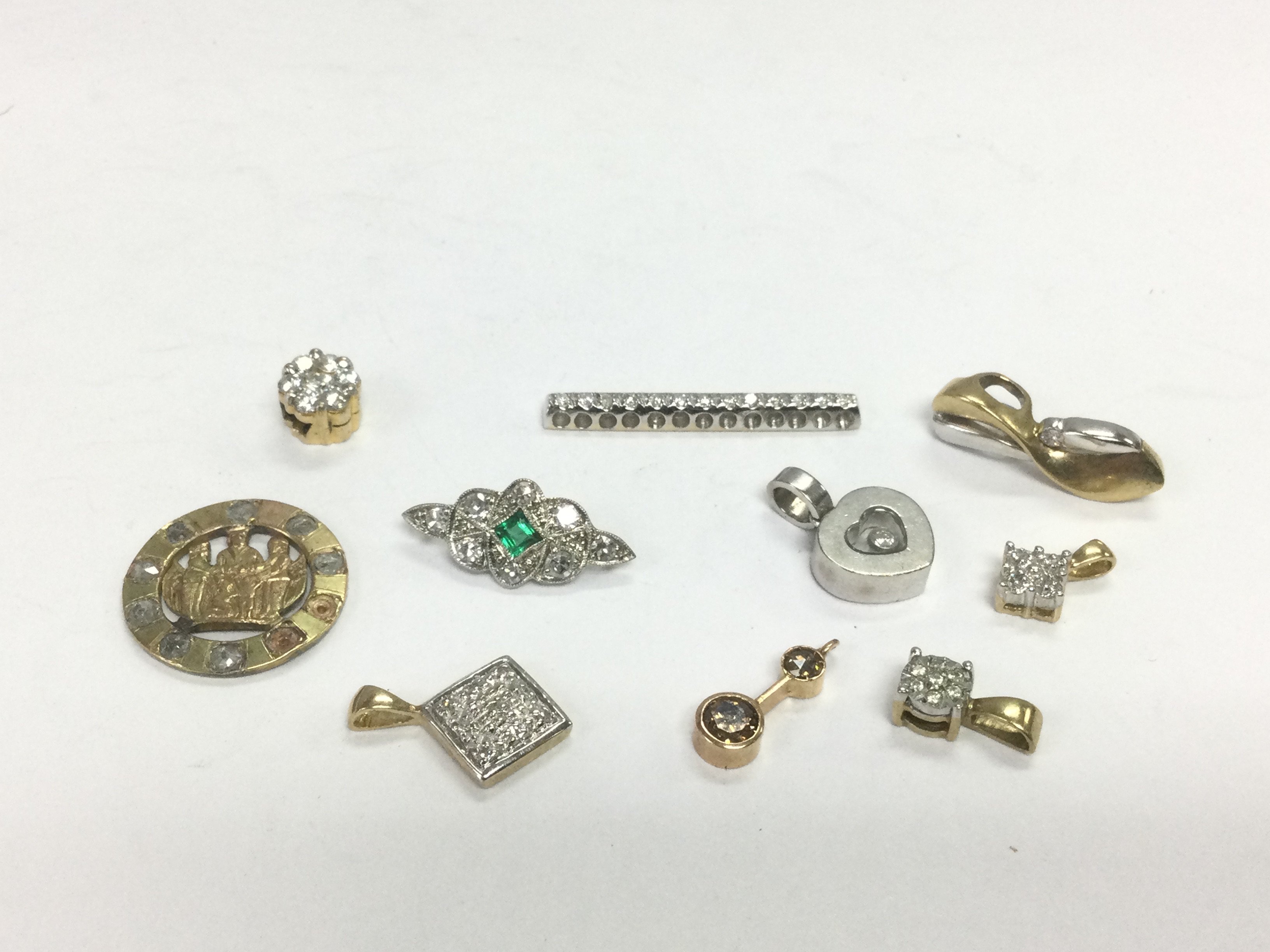 Ten gold pendants set with stones, total approx 14.7g. Shipping category A.