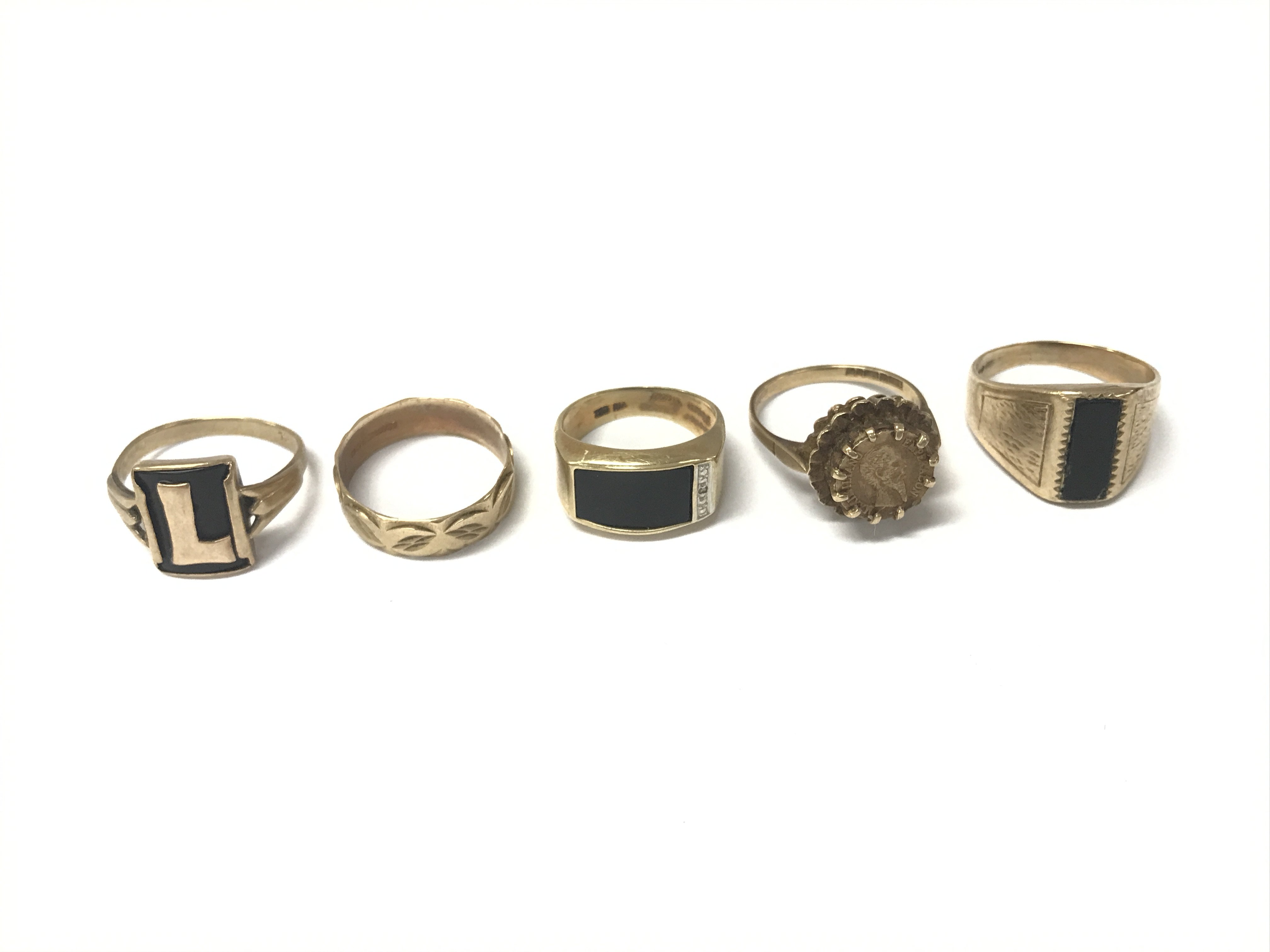 A collective lot of 5 9ct gold rings of various designs. 17.20g Postage B