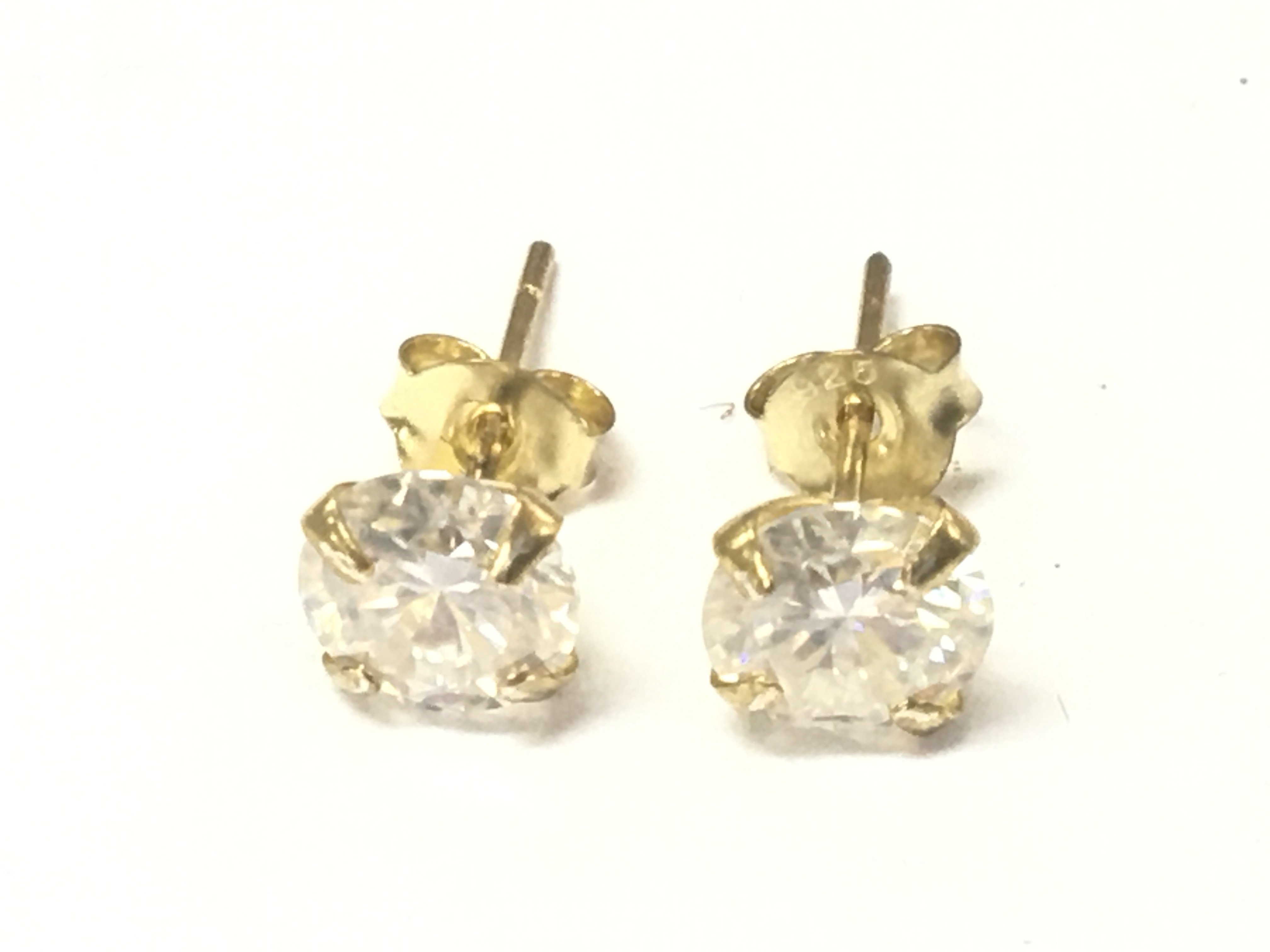 A pair of 1 ct Moissanite solitaire studs. Both with GRA reports. Postage B