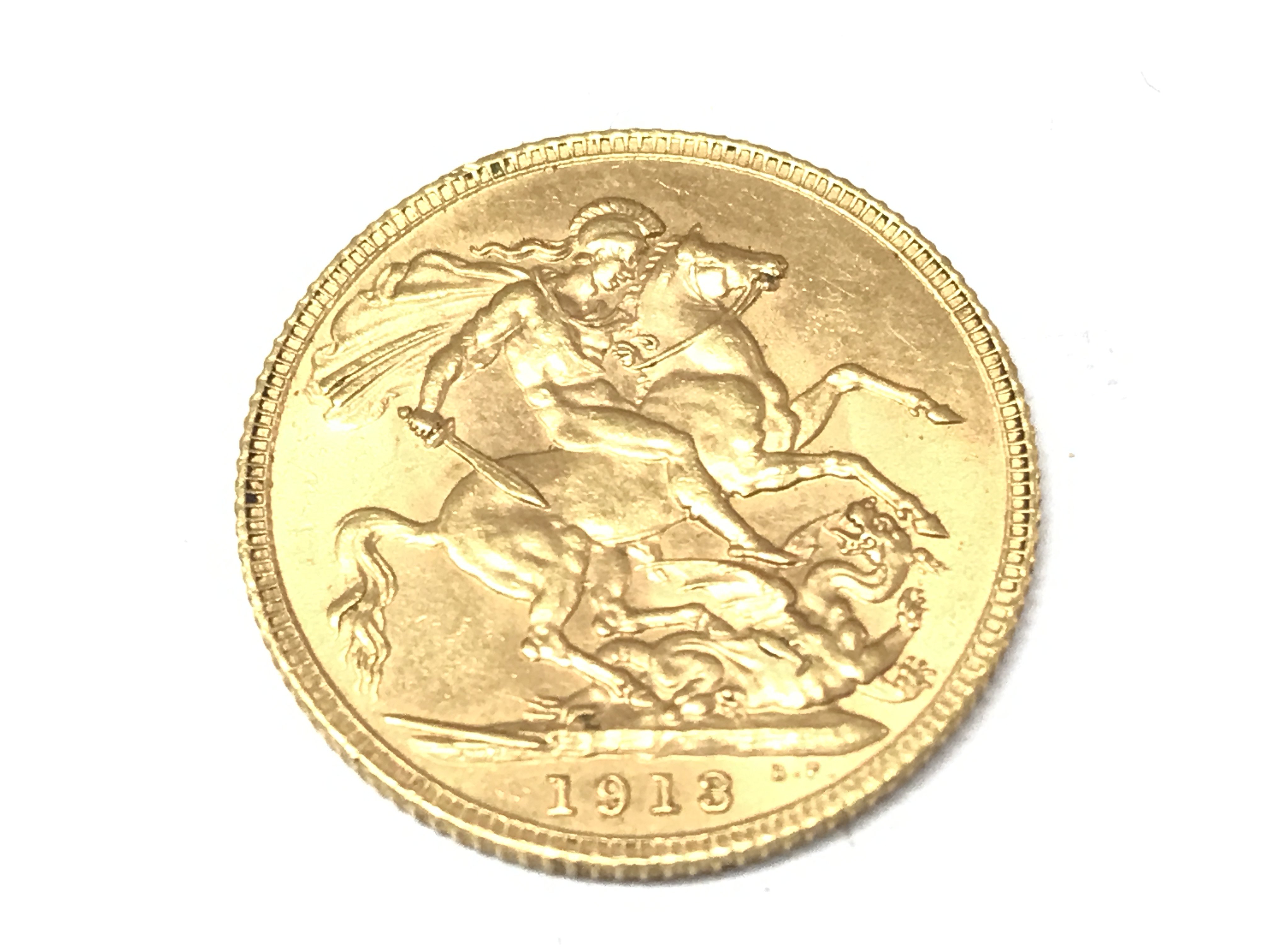 A 1913 full sovereign. Postage A