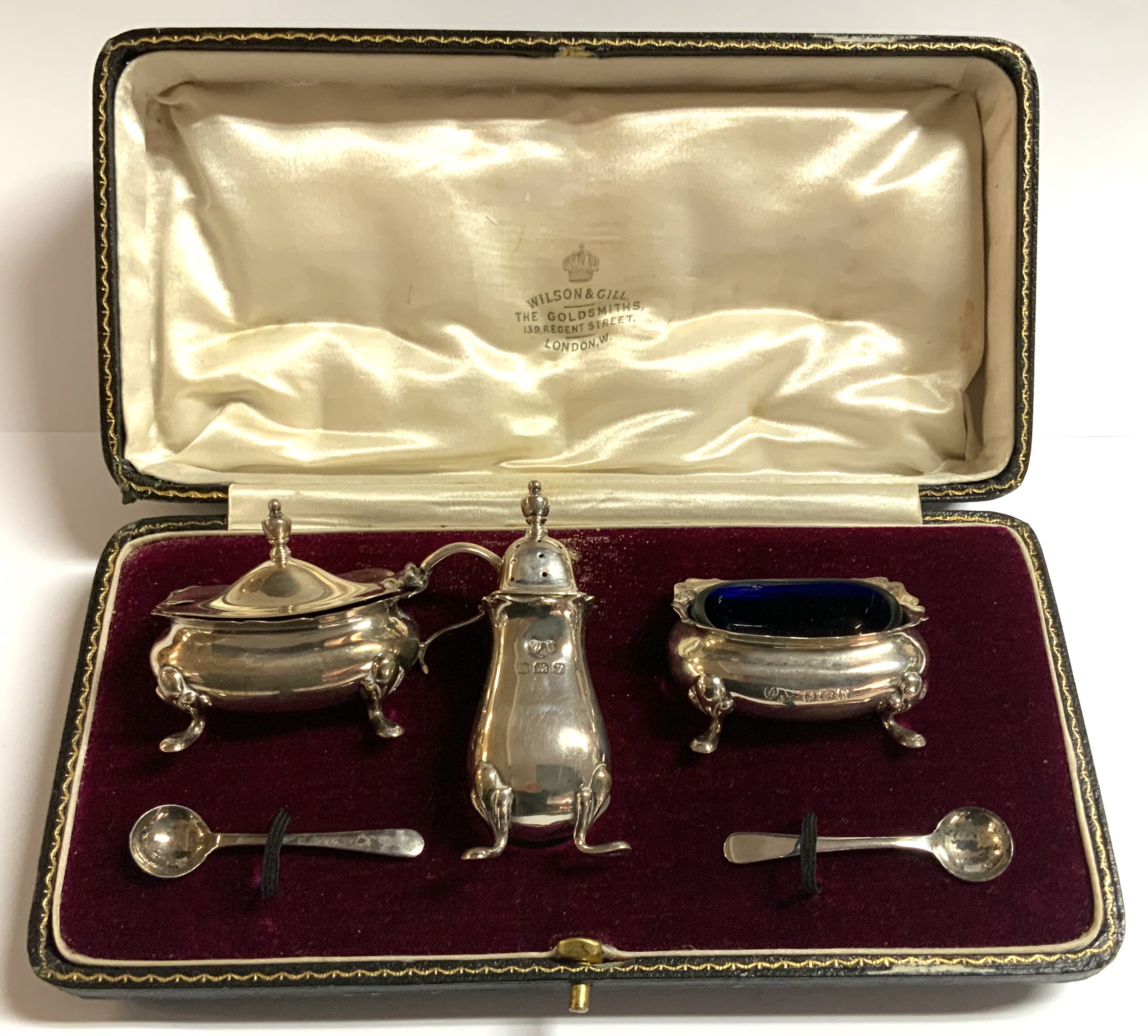 A cased hallmarked silver cruet set, Wilson & Gill.