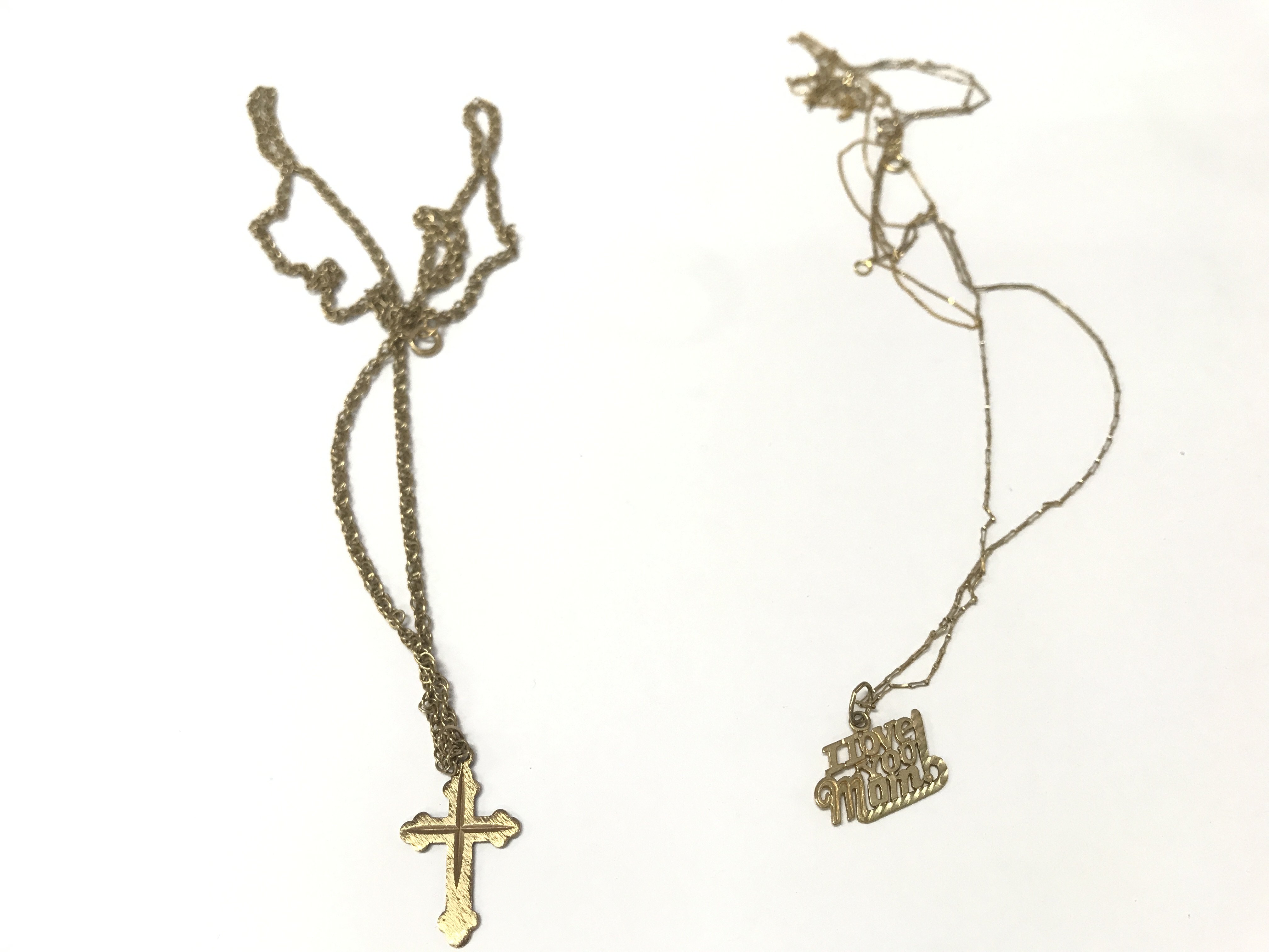 Twon9ct gold necklaces with pendants and a 9ct chain. Total weight 6.25g