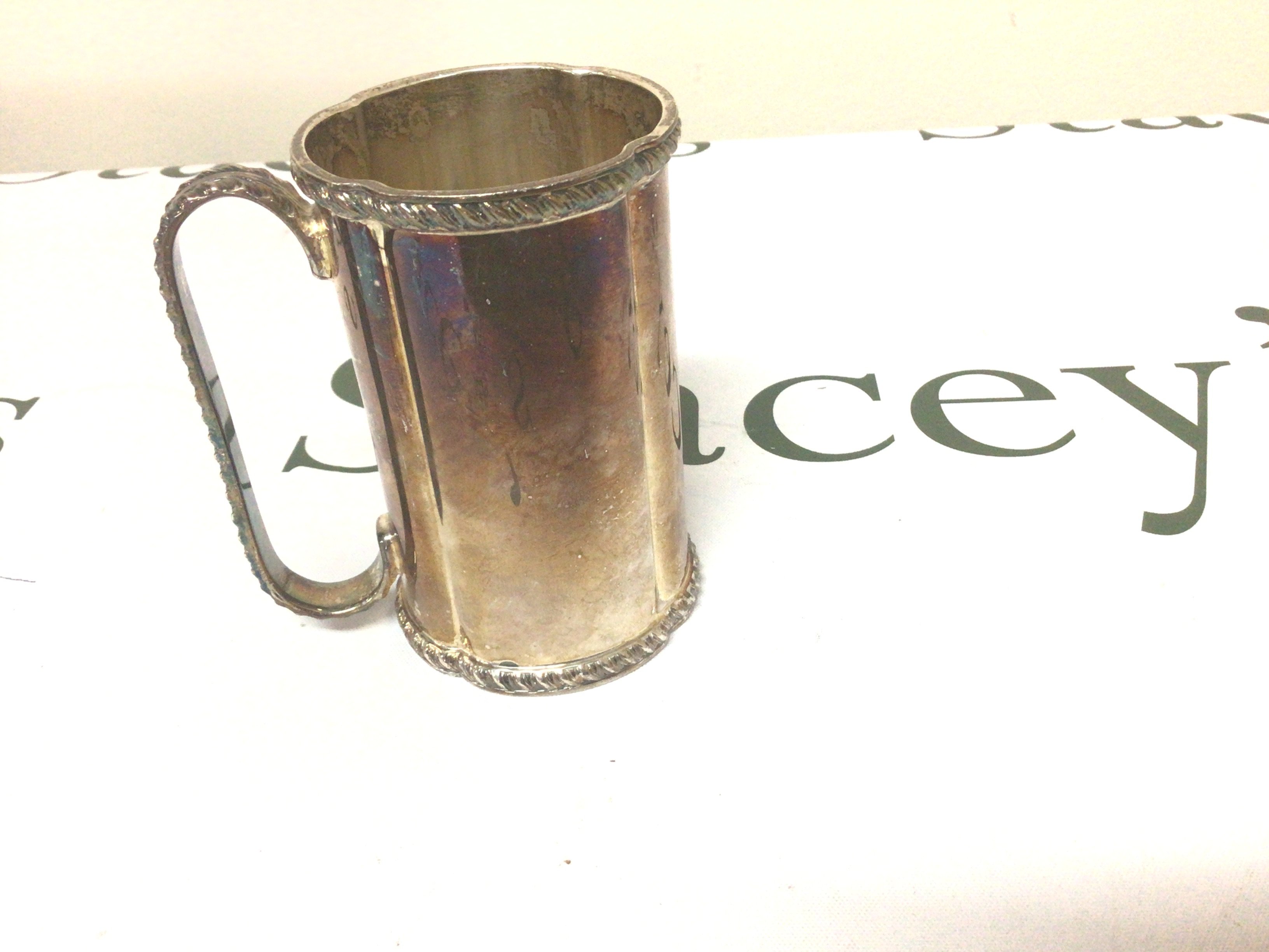 A Continental white metal tankard possible Italian stamped 800 the base with an inscription weight 197g
