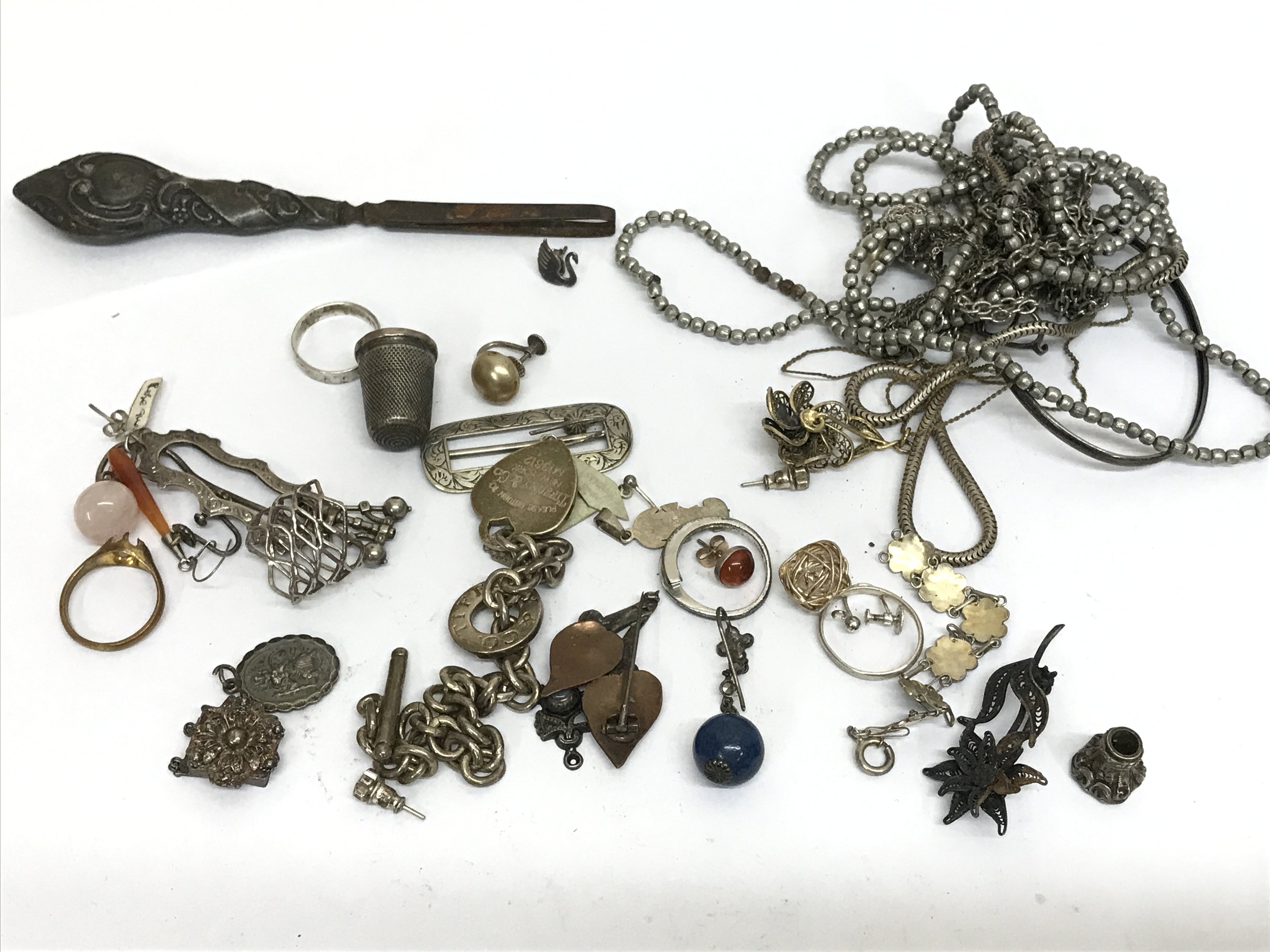 A mixed collection of jewellery including rings, necklaces . Postage category b