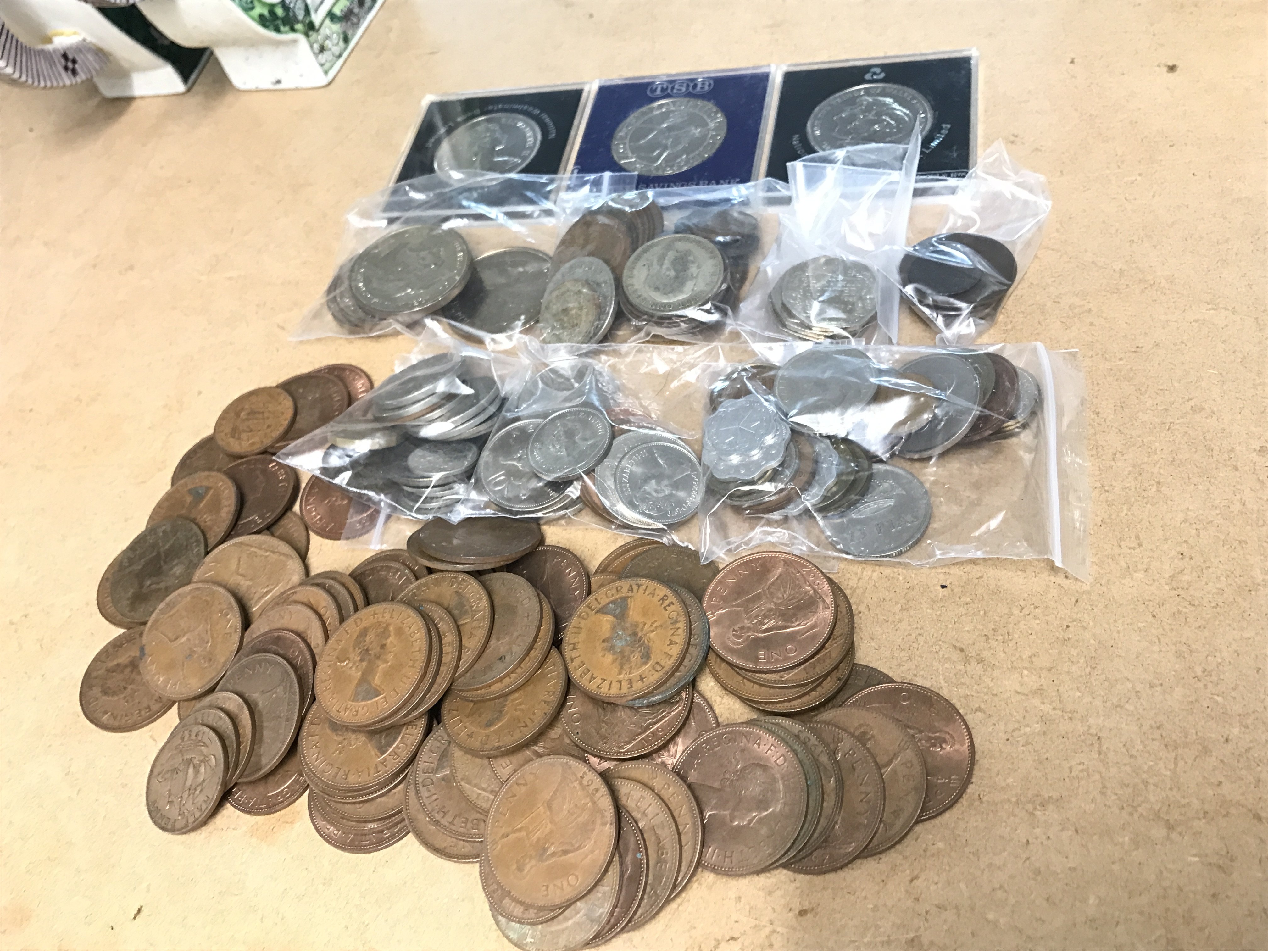 A collection of British and some world coins including shillings, pennies , 1830 Maravedis Coin etc. postage category A