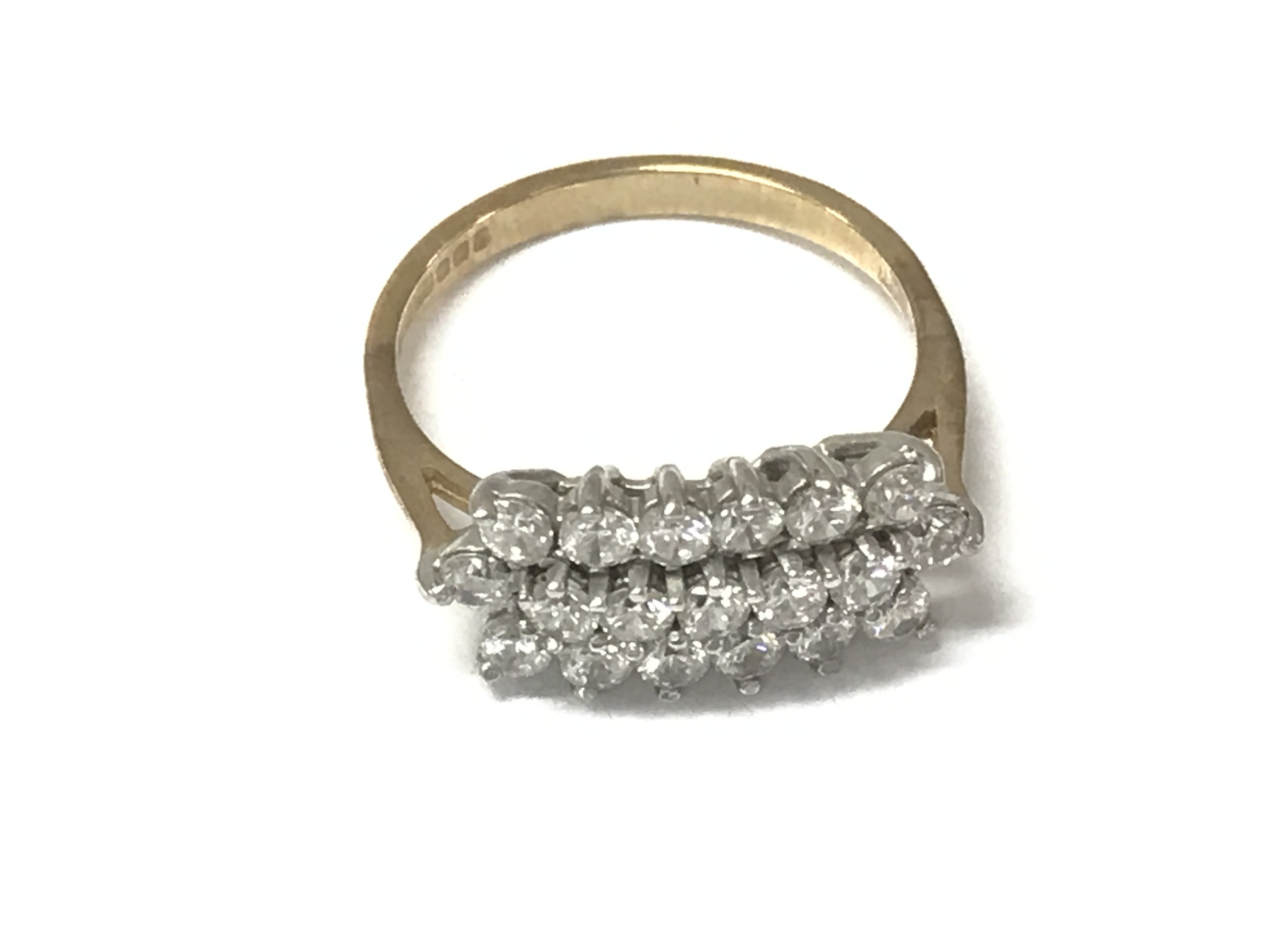 A 9ct gold cluster ring set with CZ. Size K 1/2 and 2.37g