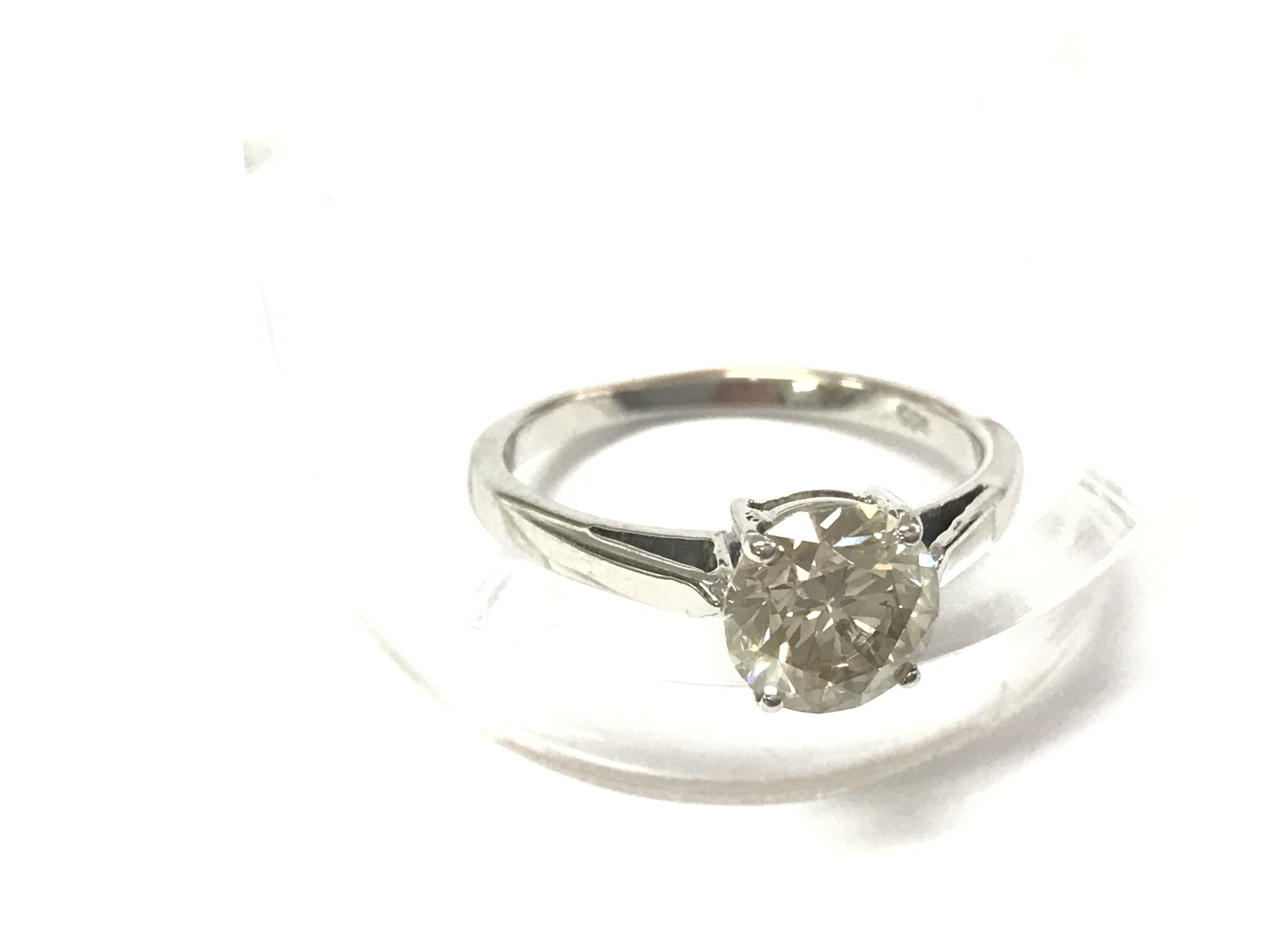 A 14ct white gold diamond solitaire ring. Diamonds 1.60ct comes with gemological report. Size PPostage A