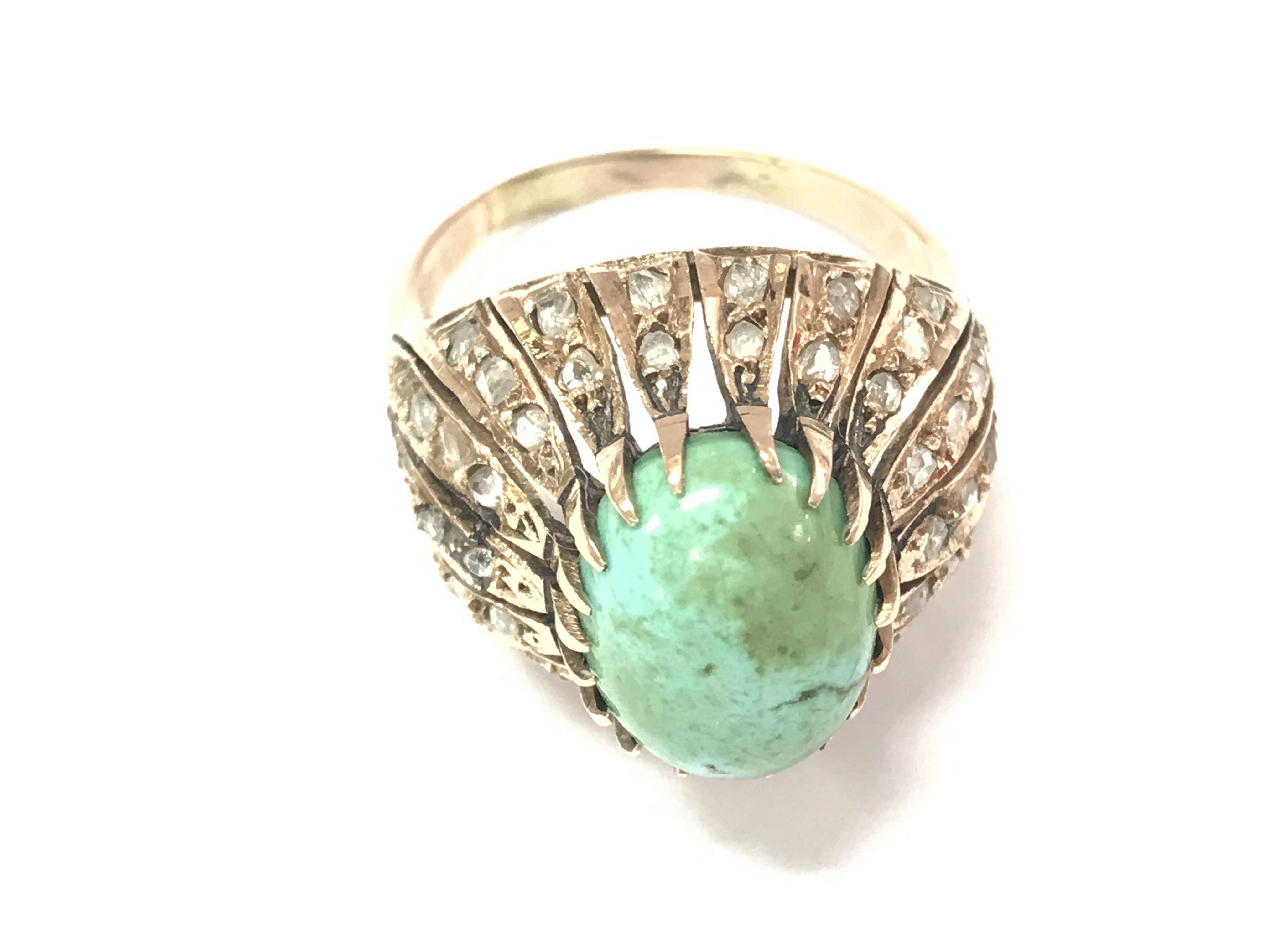 A high carat yellow golf vintage cocktail ring set with a large turquoise and rose cut diamonds. Size T