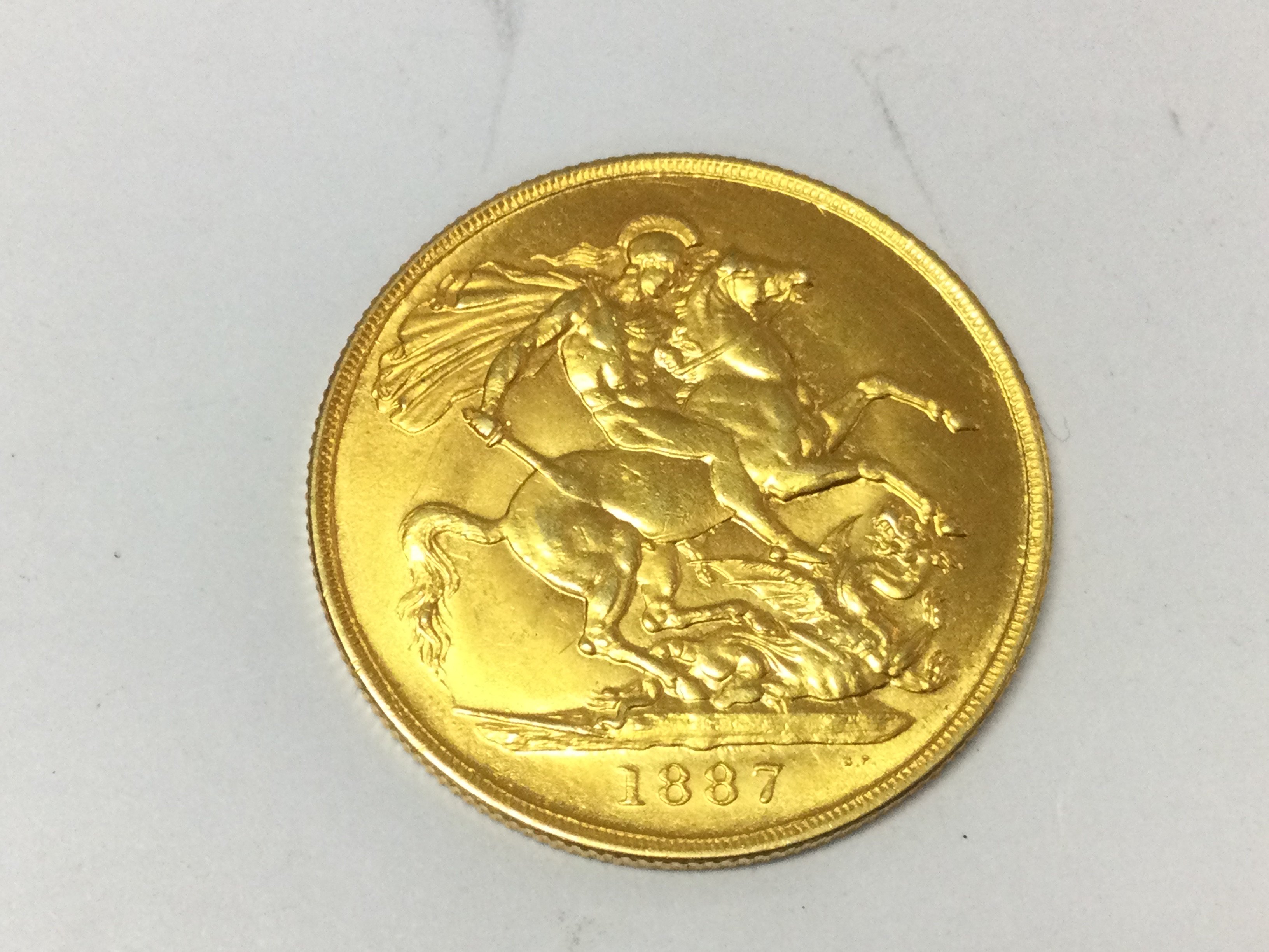 A 1887 double sovereign.Postage A