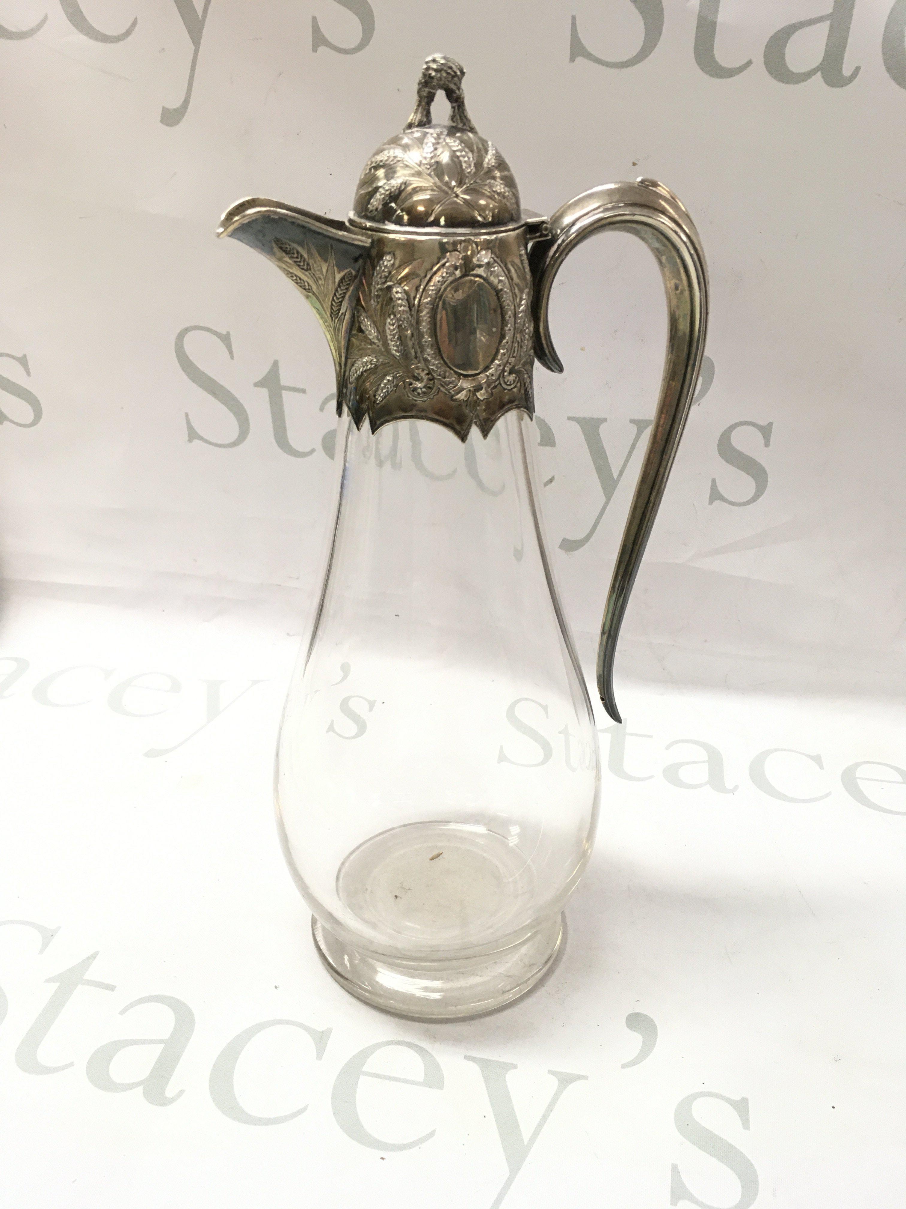 A Victorian silver hallmarked claret jug.