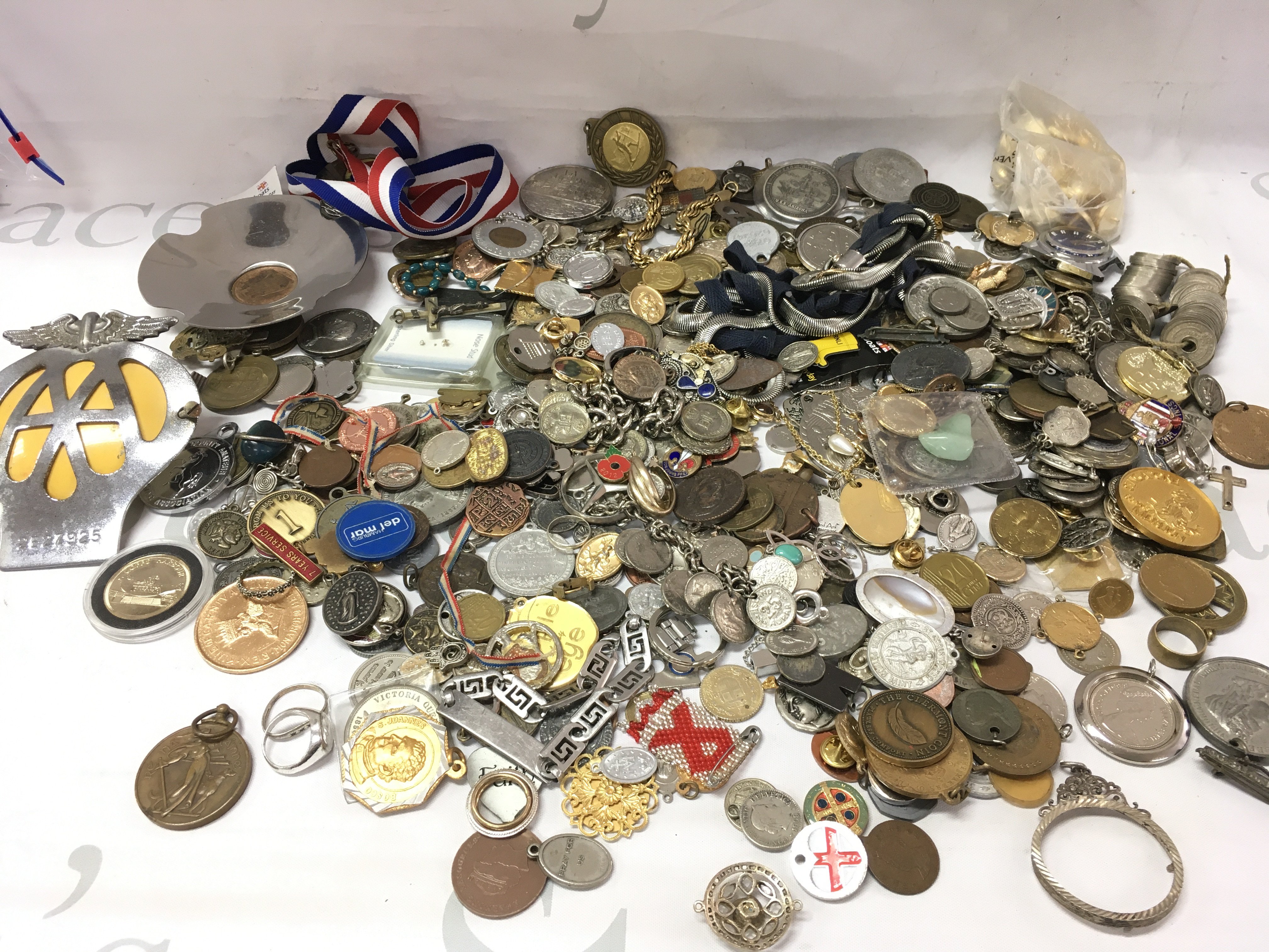 A collection of costume jewellery mixed coinage medals etc including some silver items. Postage B