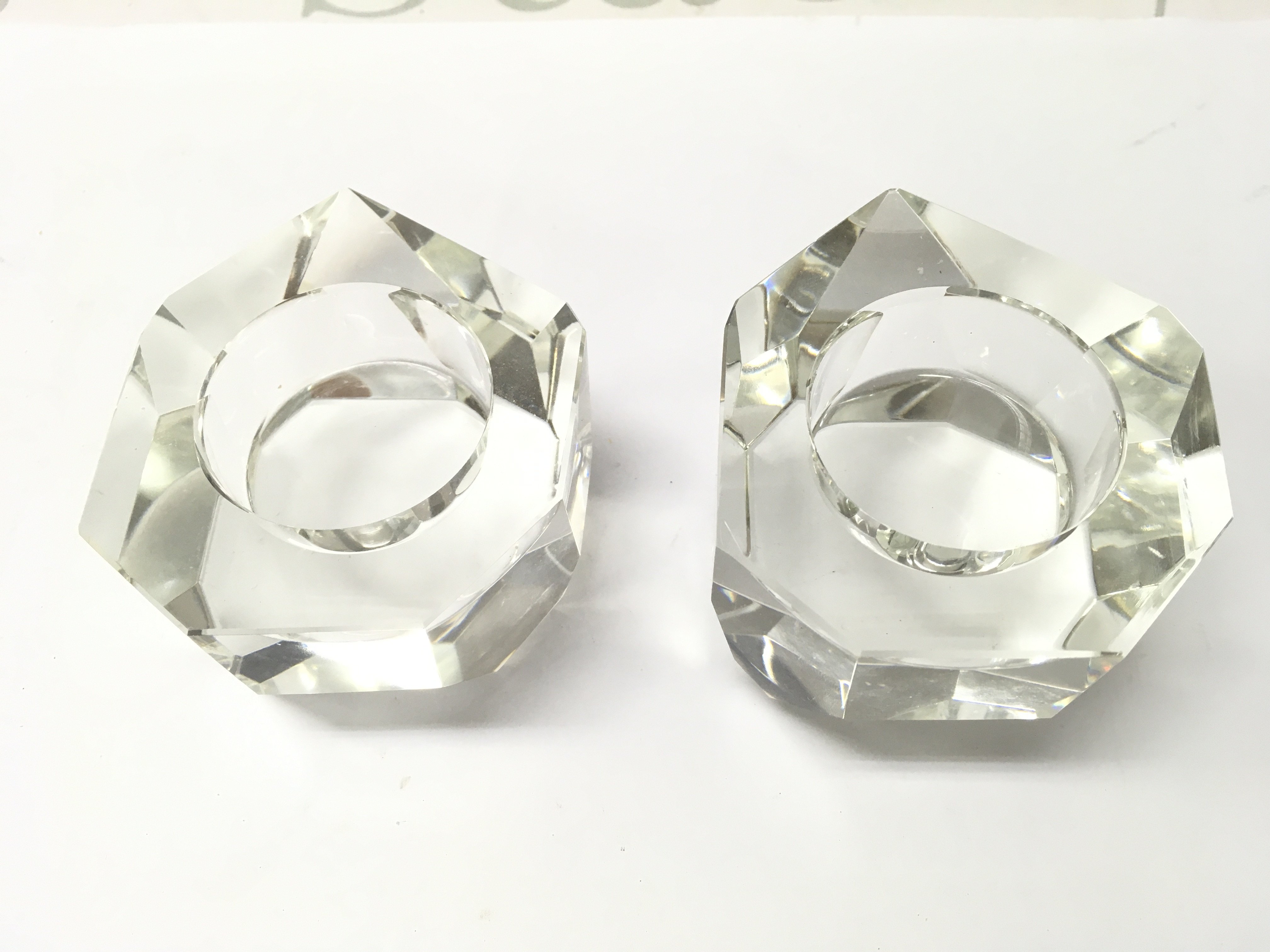Oleg Cassini glass paperweights . 4.5cm tall. This lot cannot be posted