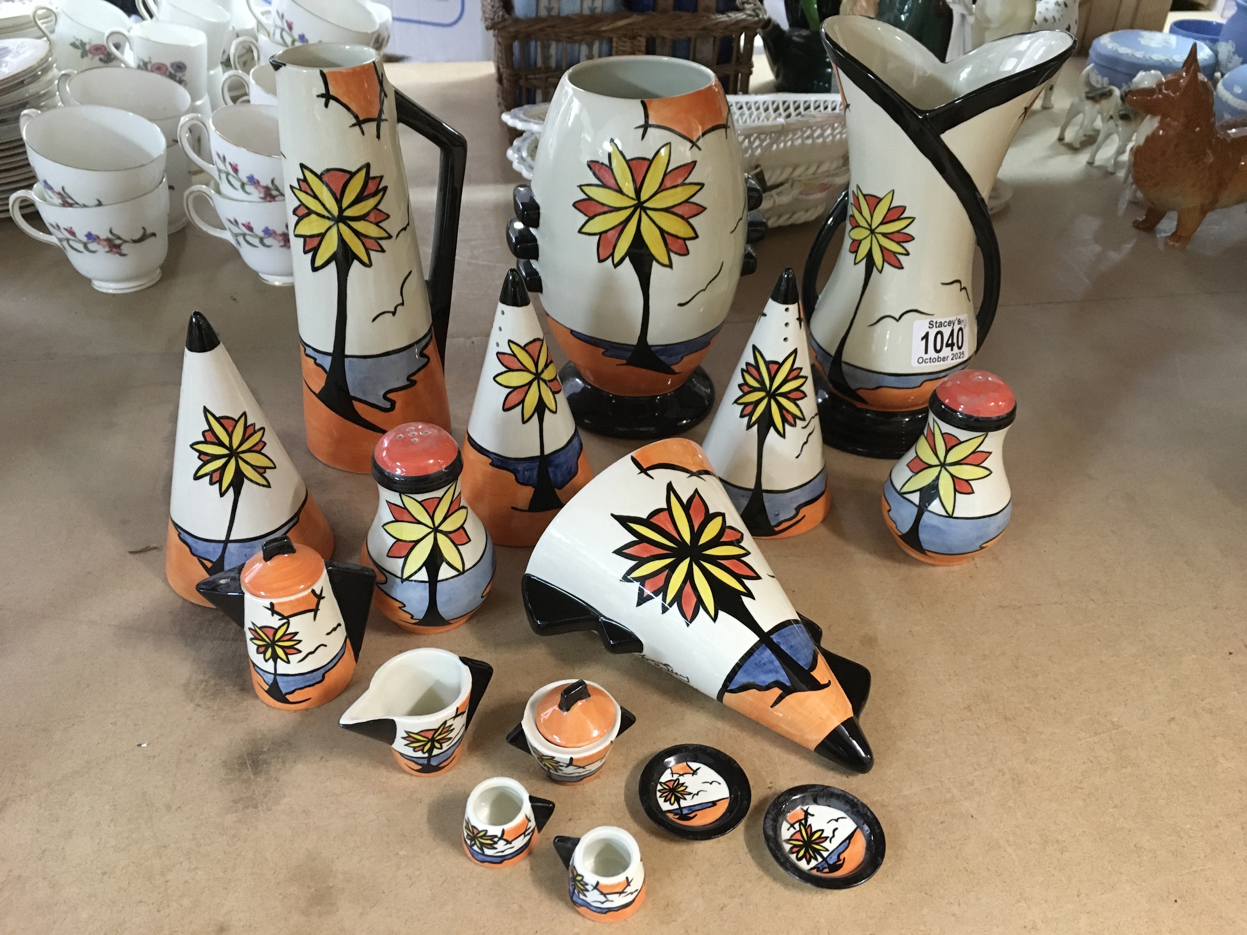 Lorna Bailey "Beach" pattern pottery, to include vases, wall pocket, miniature tea setm sugar shakers and salt and pepper pots