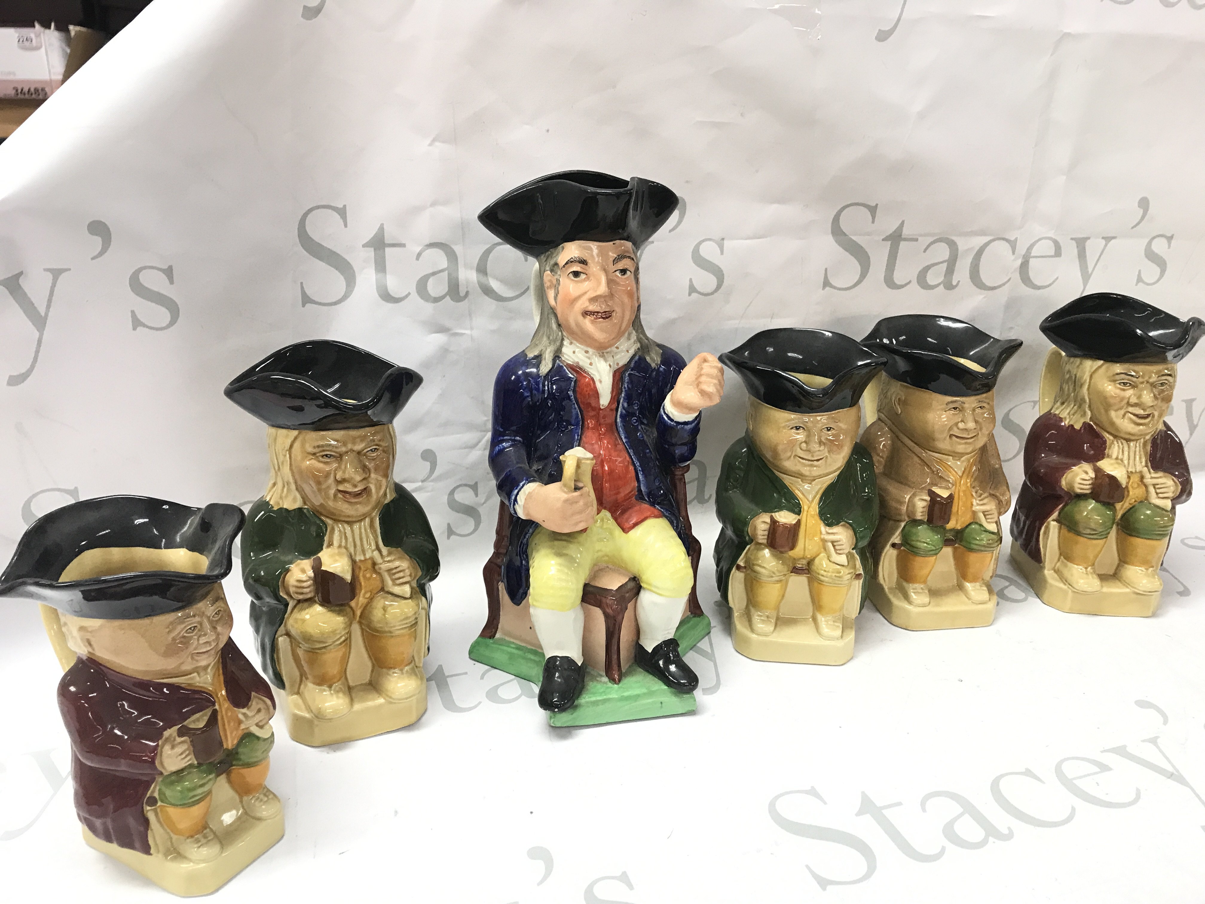 A collection of vintage Toby jugs including Wood & Sons, this lot cannot be posted