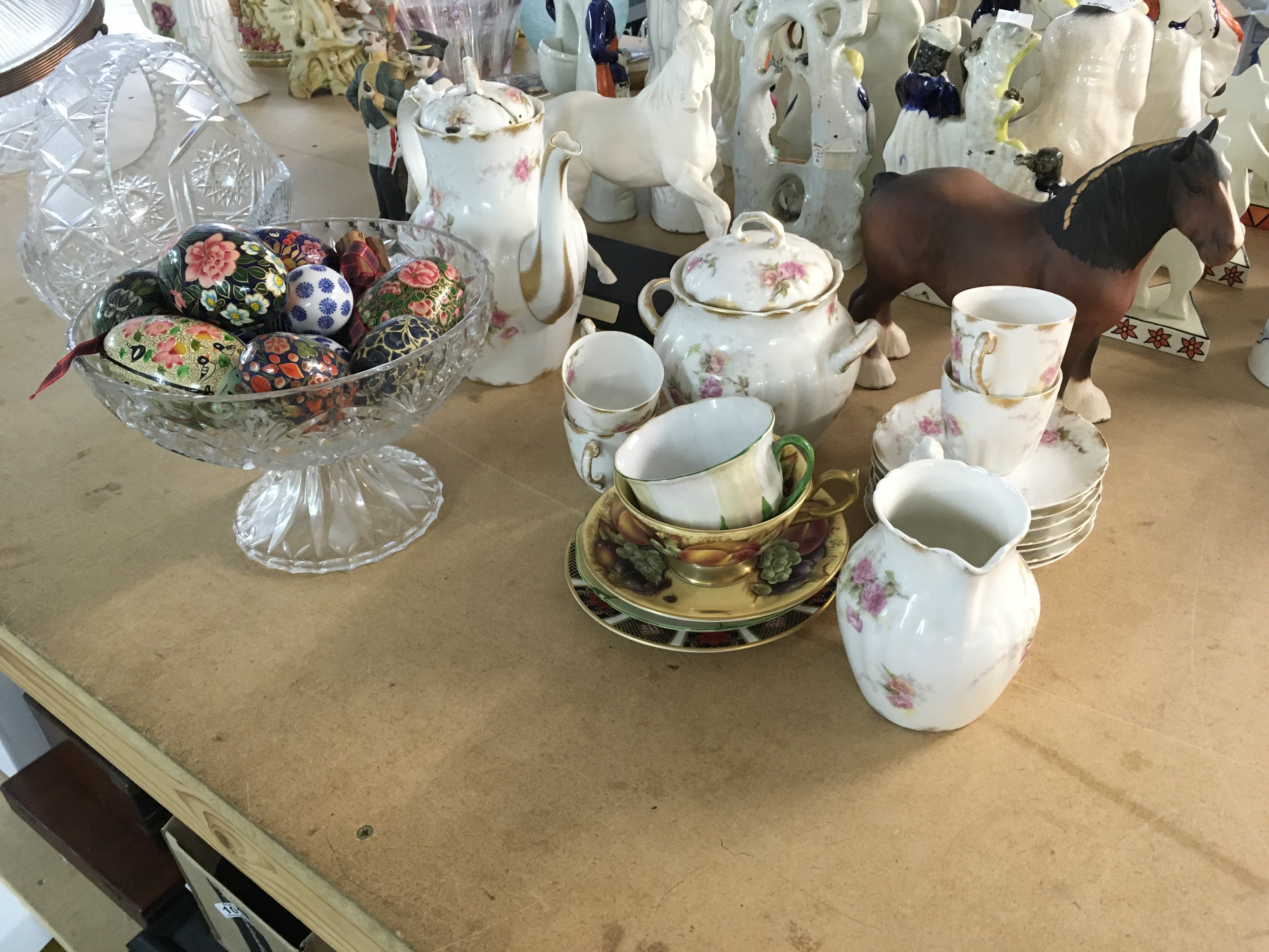 A collection of assorted ceramics and cut glass including cups and saucers horse figurines etc.