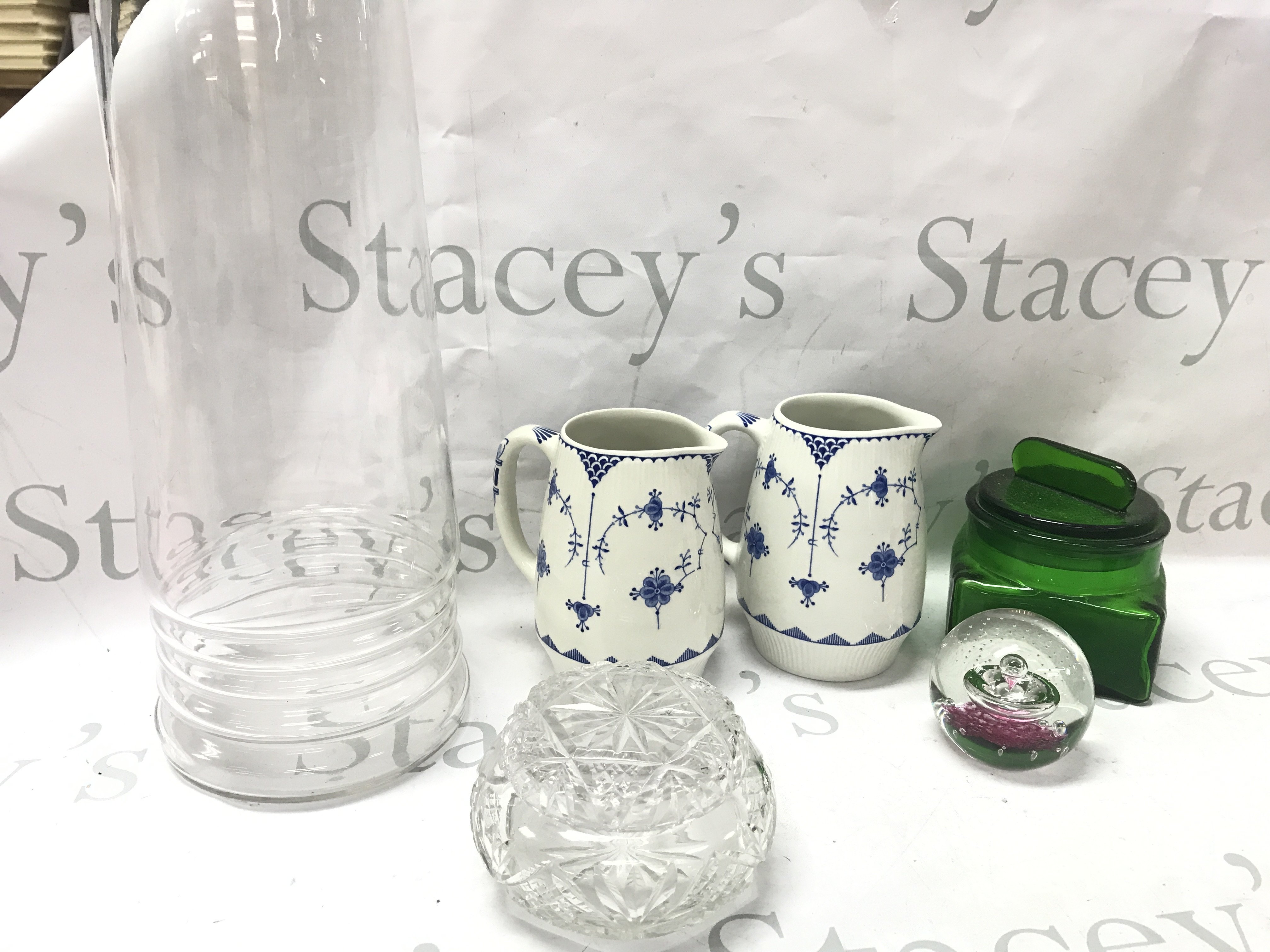 A collection of ceramics including Denmark blue and white jugs, Caithness paperweight, a very tall glass jar possibly for sweets (58 cm tall )