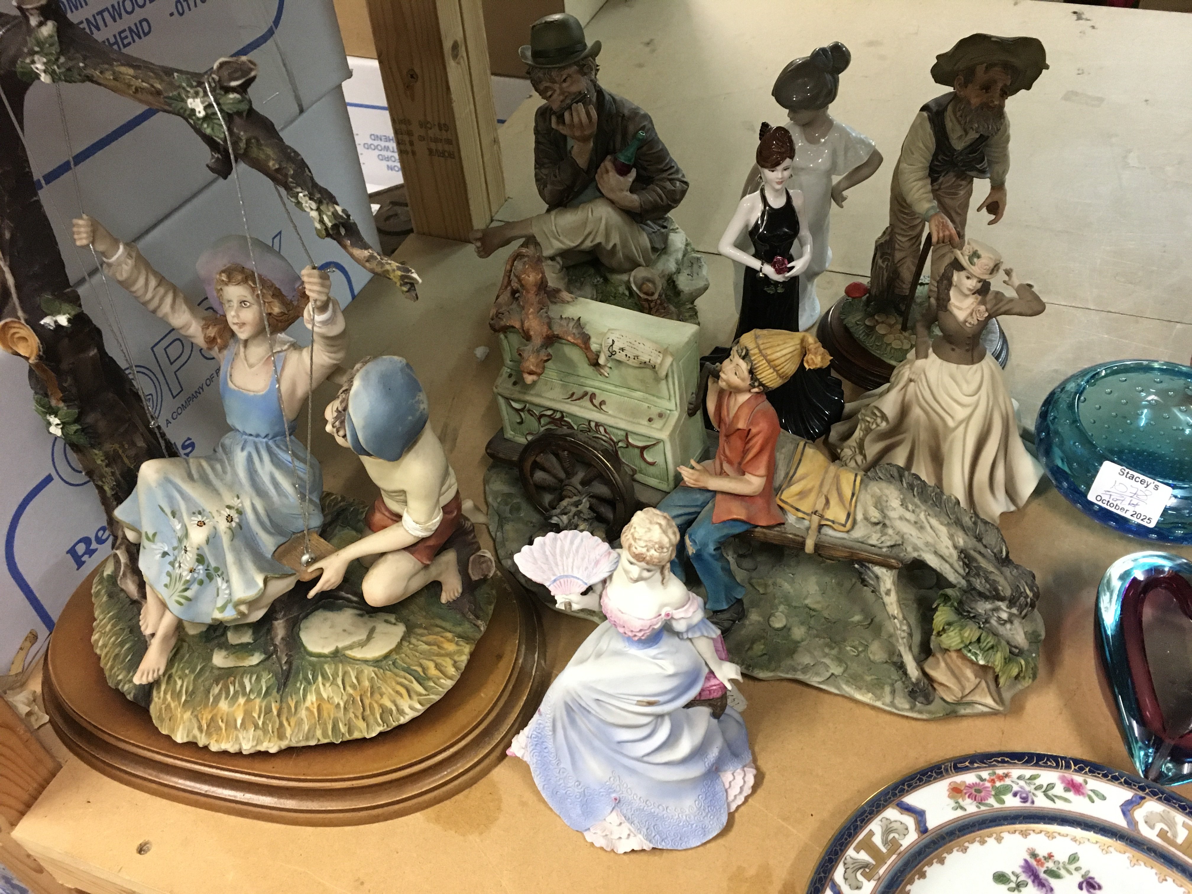 A Collection of 8 figures including Coalport and capodimonte. and two Chinese style plates .