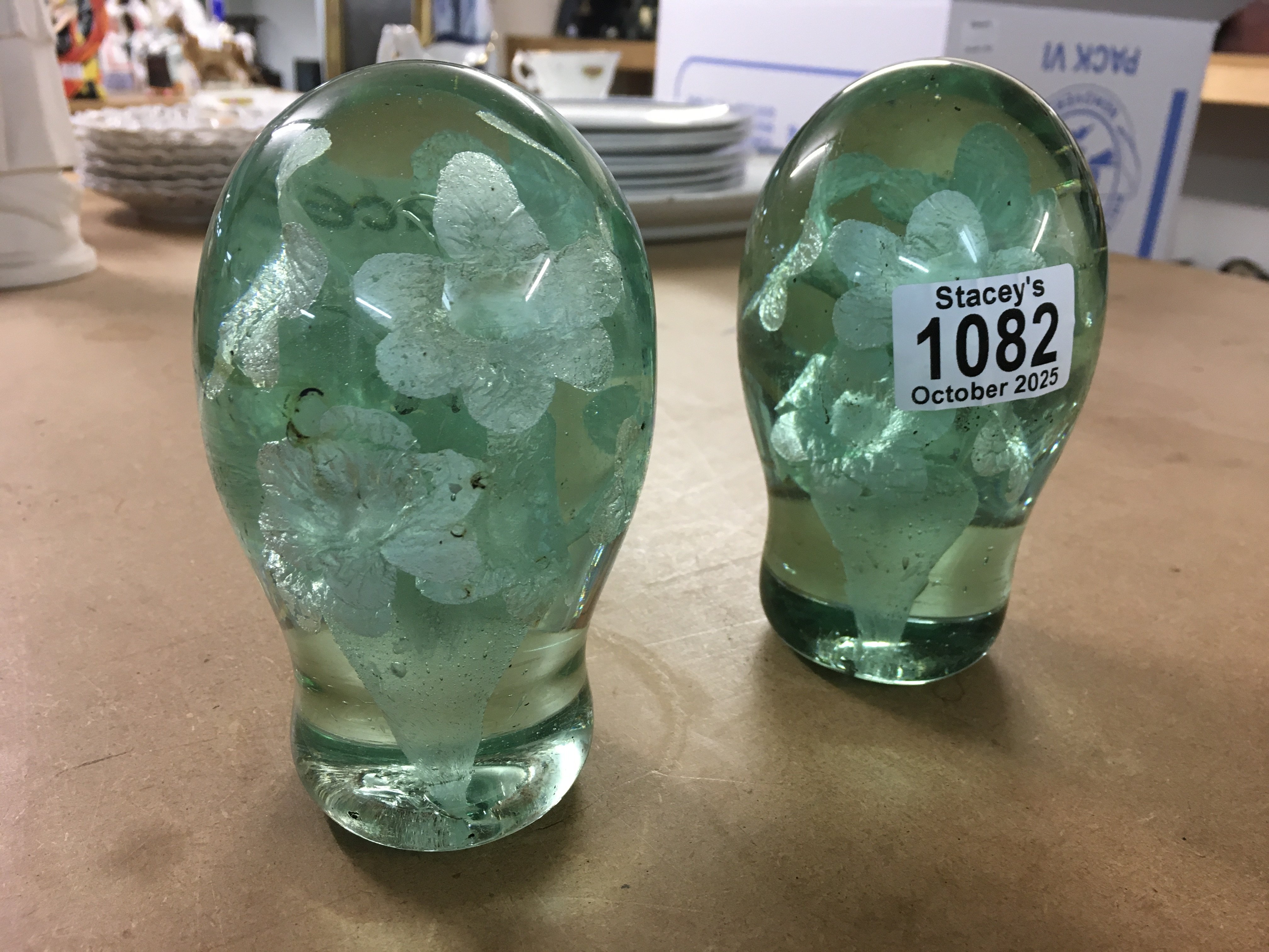 A pair of paper weights.