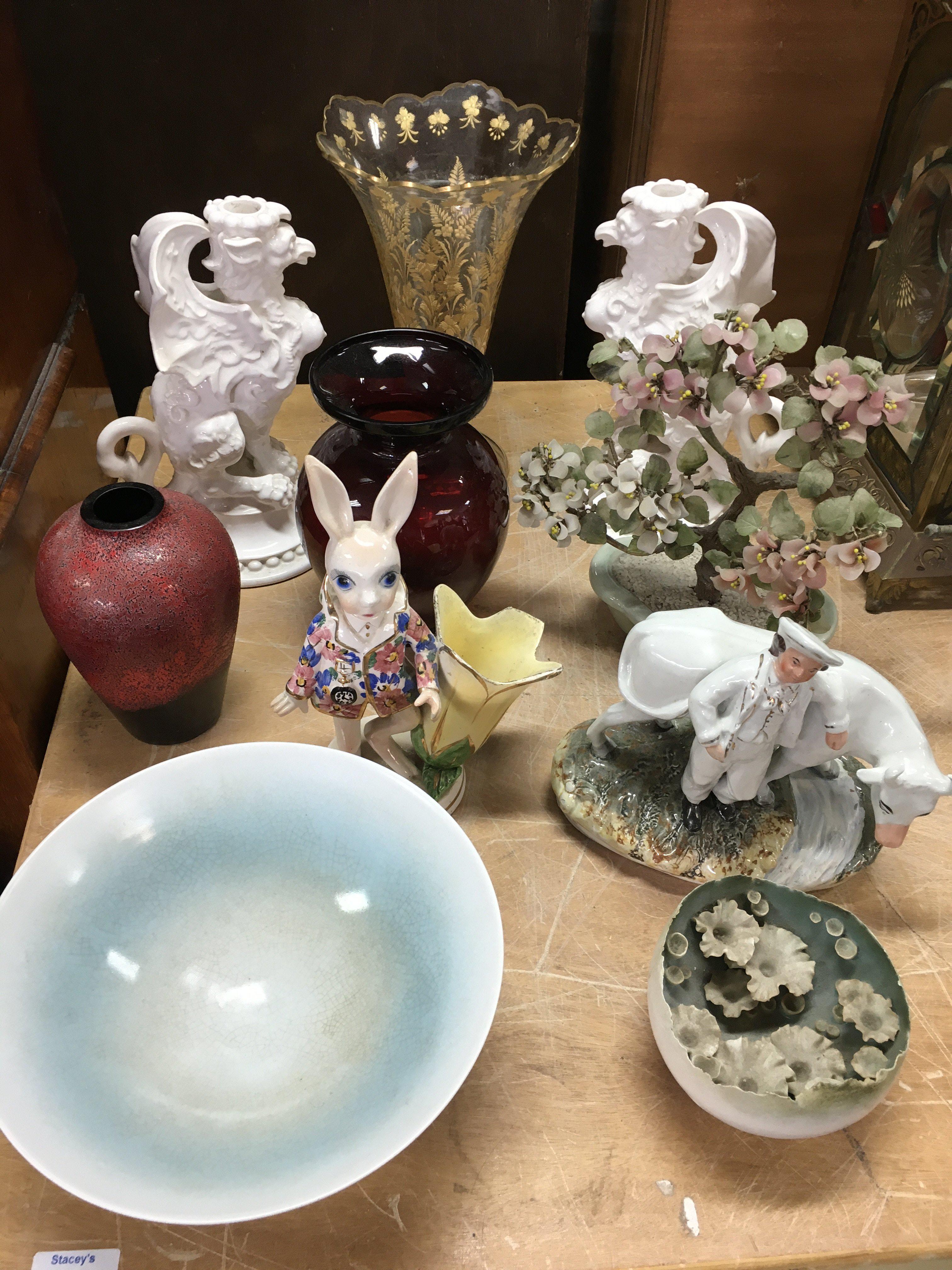 A Collection of ceramics and glassware including a gilt decorated glass vase and a pair of Griffin candlesticks