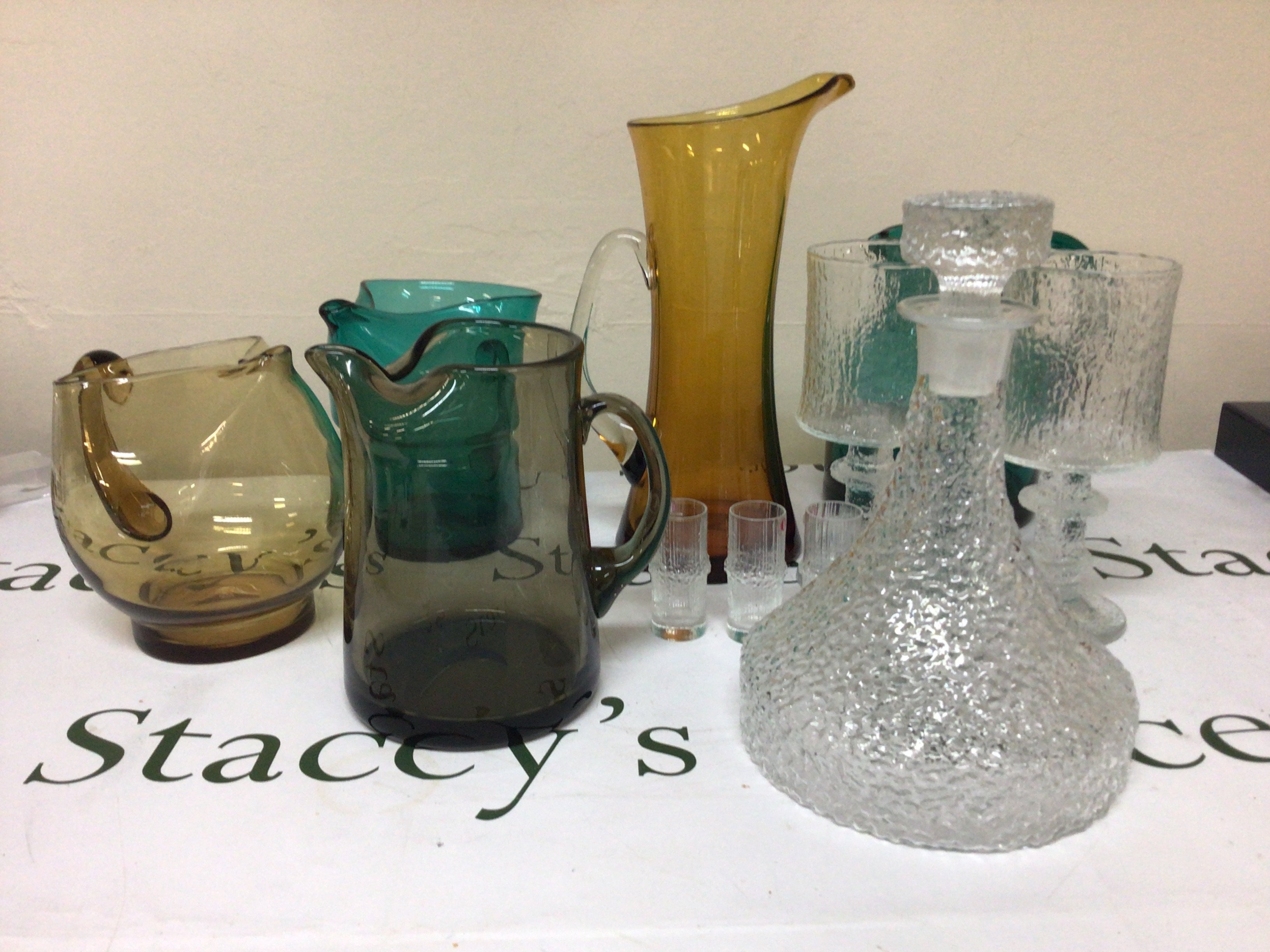 A collection of mid 20th century Art Glass including Littala Whitefriars and coloured glass jugs. No obvious damage.