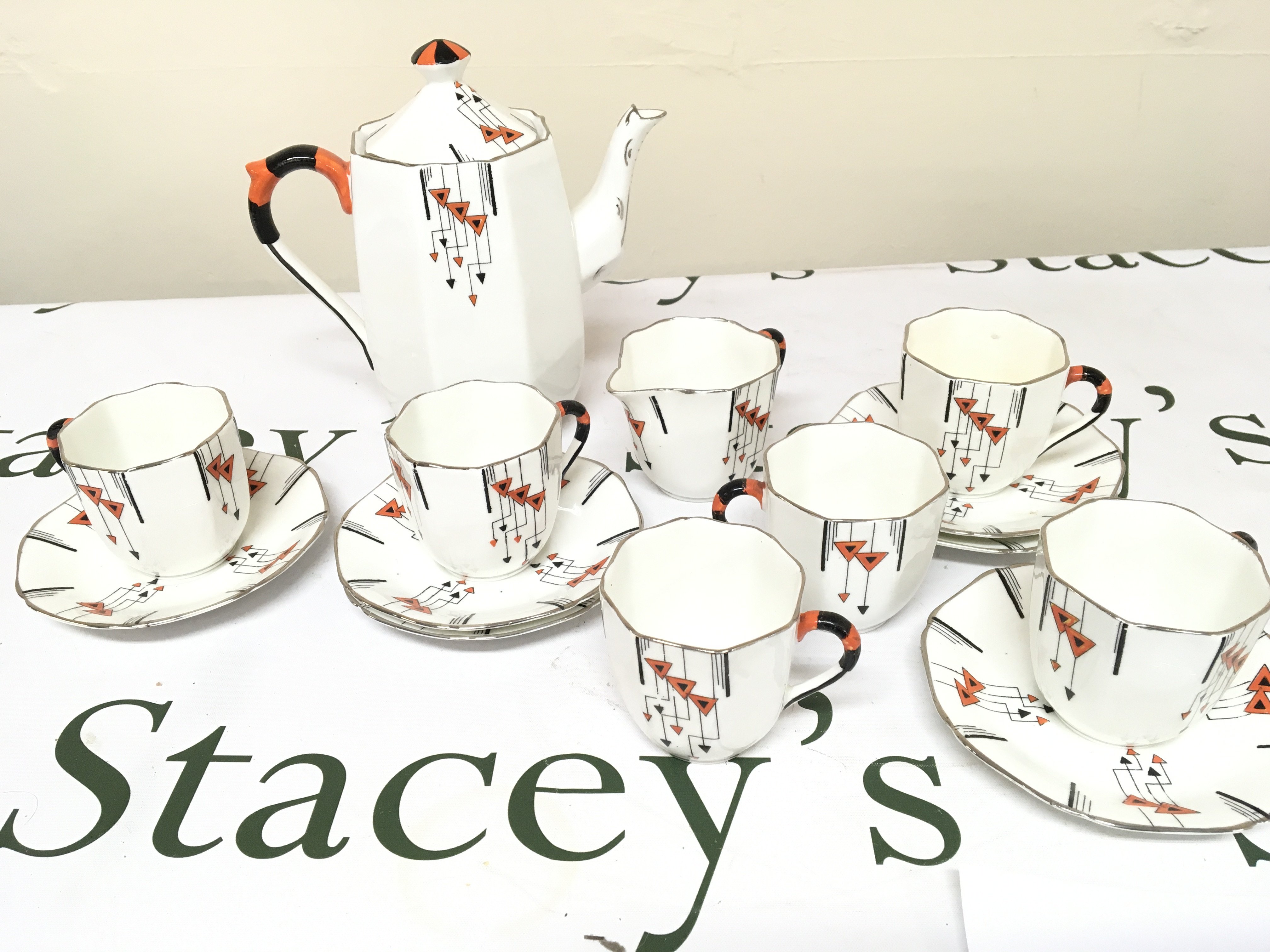 A decorative Art Deco design Sutherland China Coffee set transfer and hand painted pattern six place setting no obvious damage.