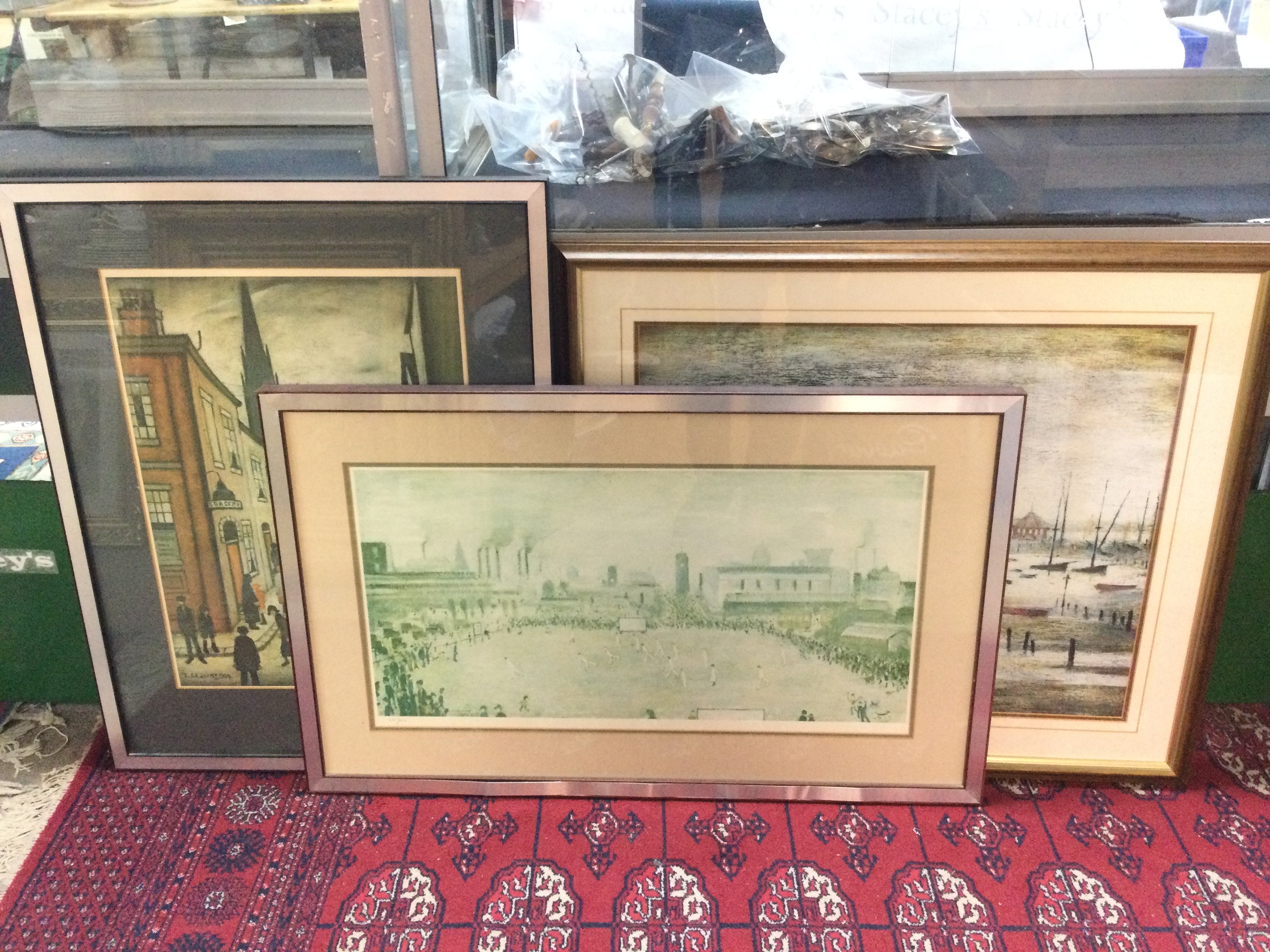 Three framed L.S Lowry prints , two limited edition. Frame sizes 86x54cm & 60x66cm