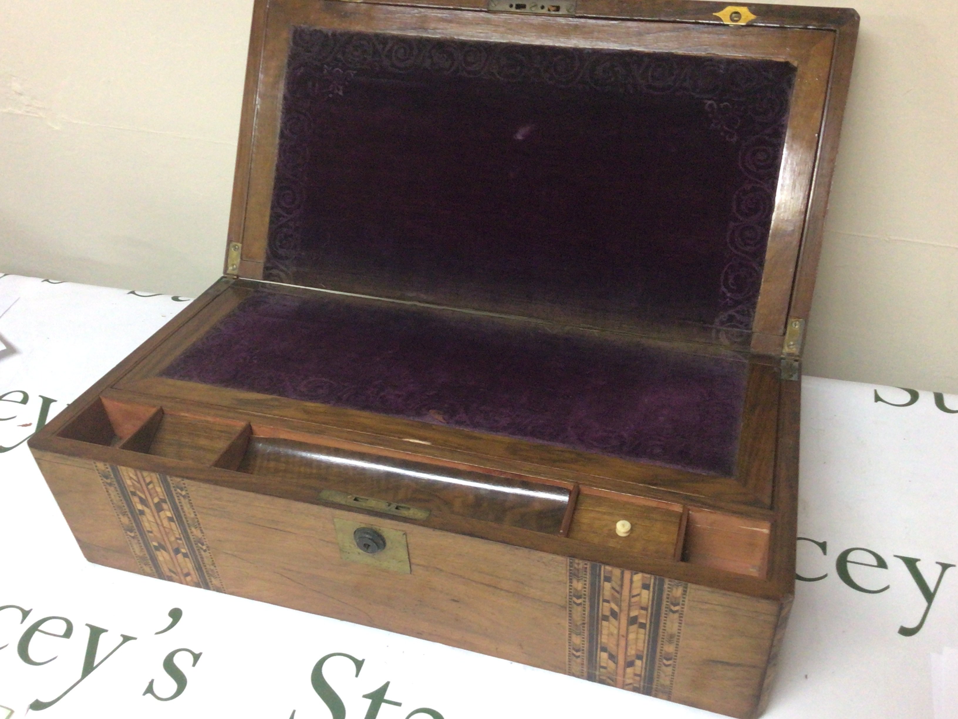 A walnut Tombridge Type writing box with a well fitted interior. 50x26ccm.