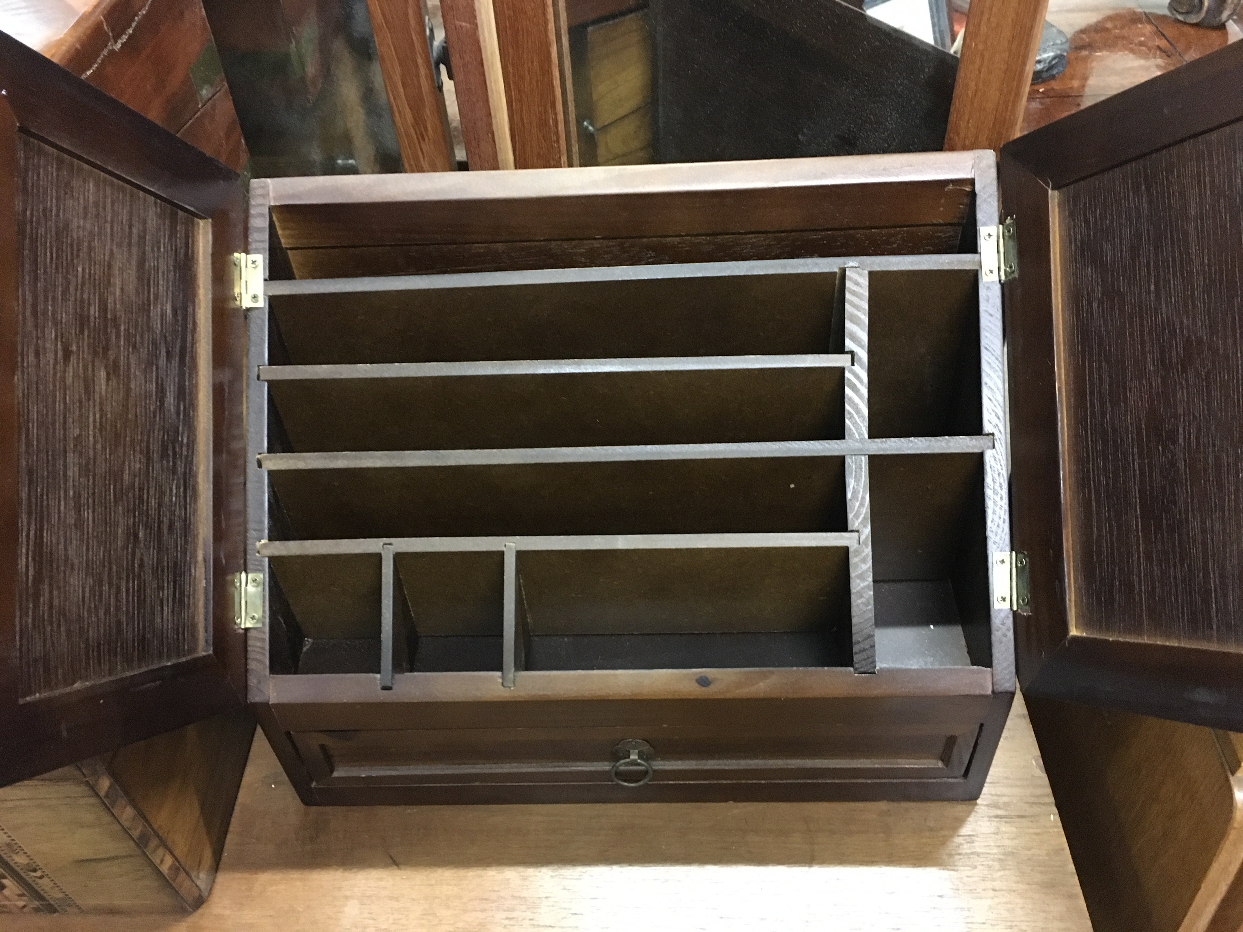 A cased Singer sewing machine and a letter rack. This lot cannot be posted- NO RESERVE