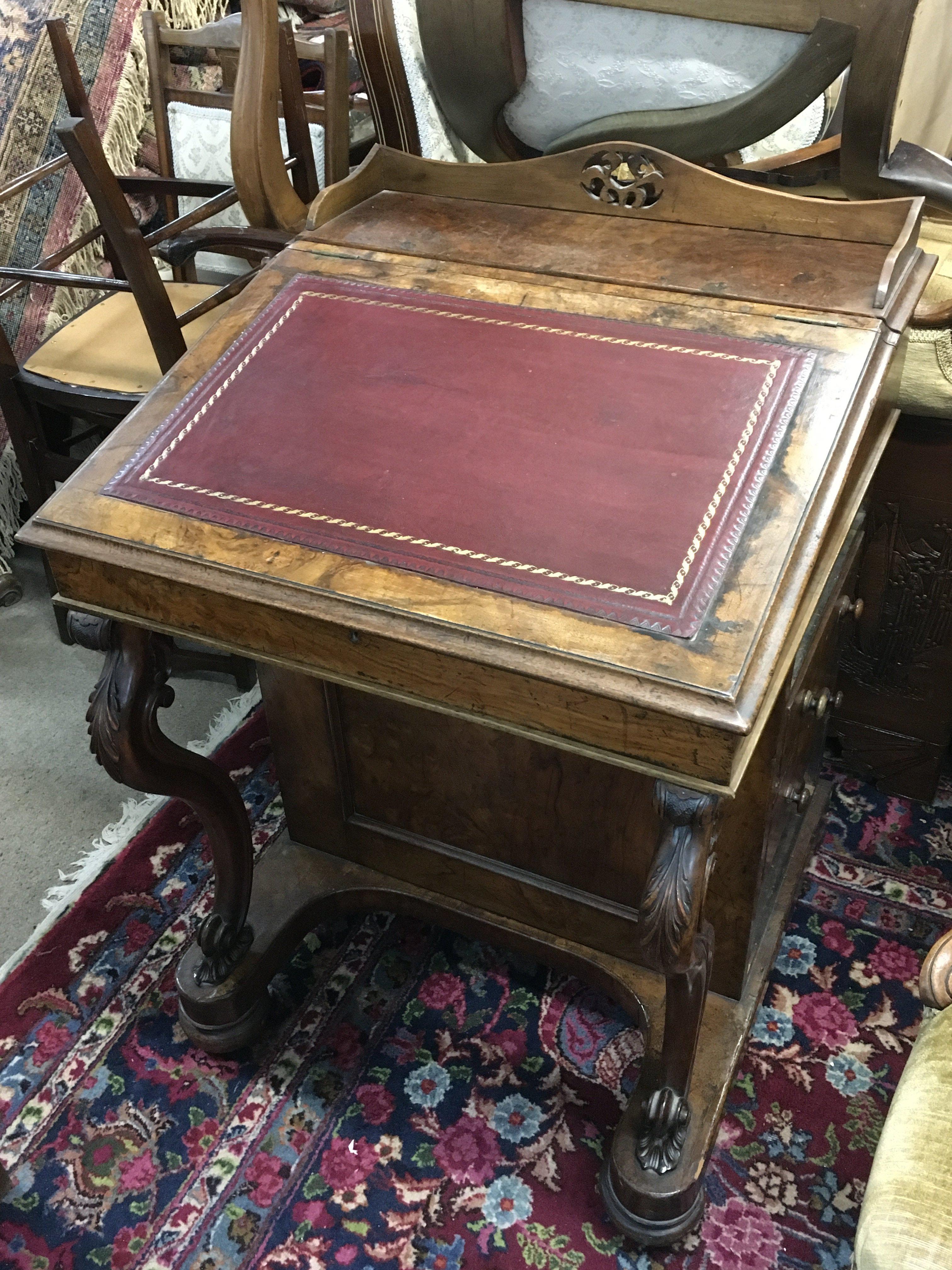 A walnut veneered davenport 60cm wide 85cm tall 62cm long