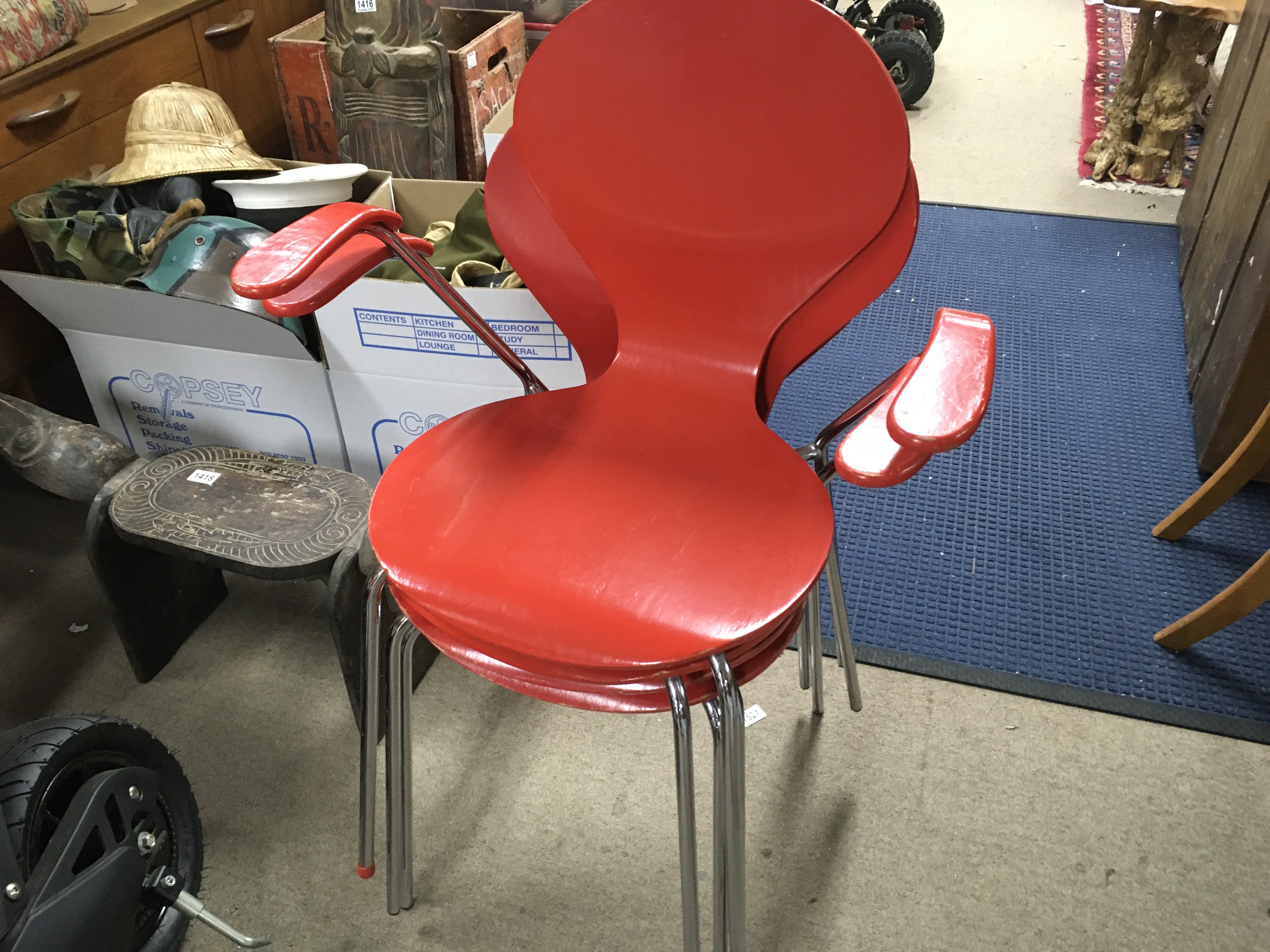 Four Danish design chairs. Red lacquered and chrome design 84cm tall 63cm wide