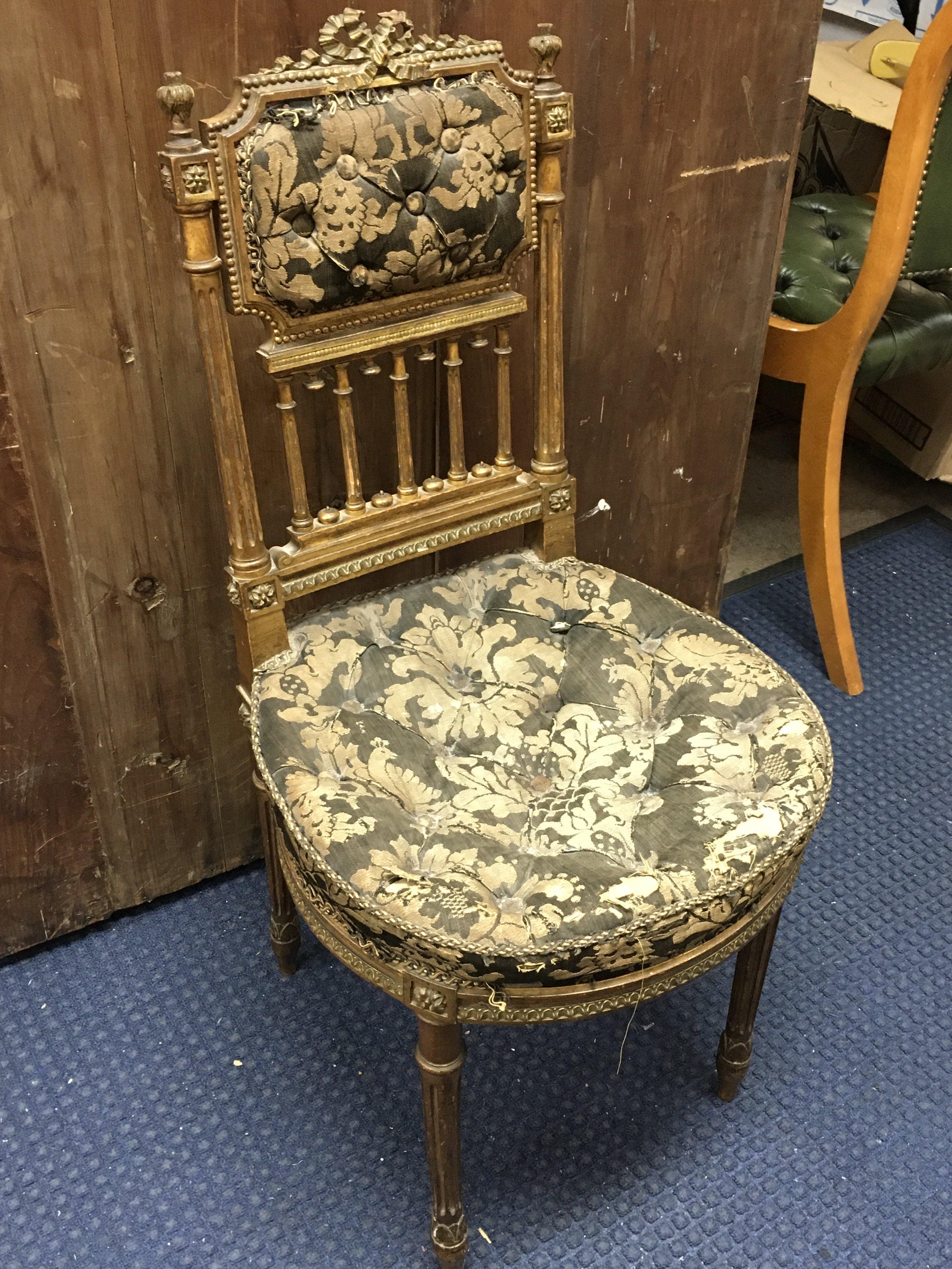 A late 19th century giltwood chair , dimensions 89cm tall 41cm wide approximately