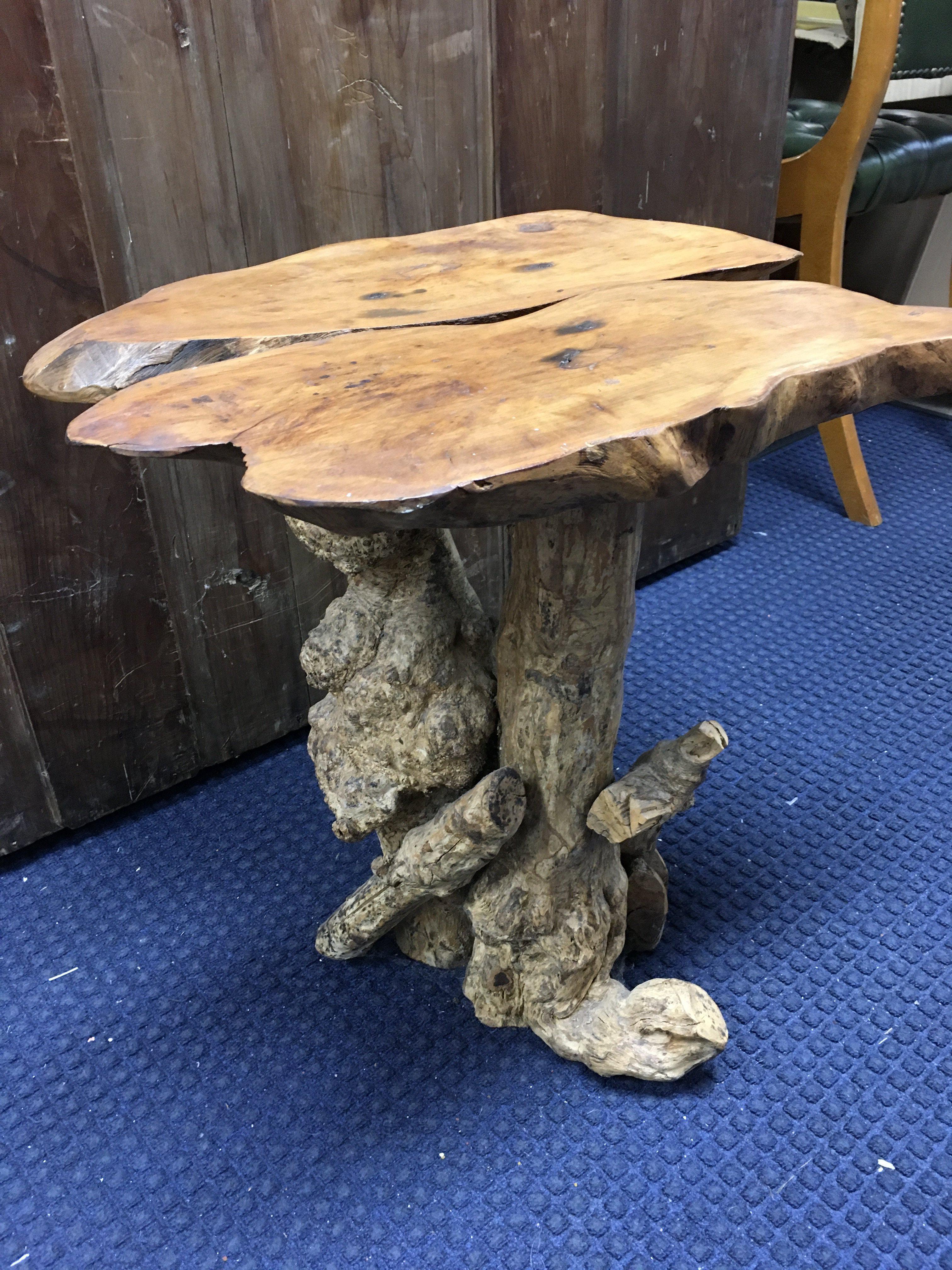 A teak root side table 50cm tall 46cm wide