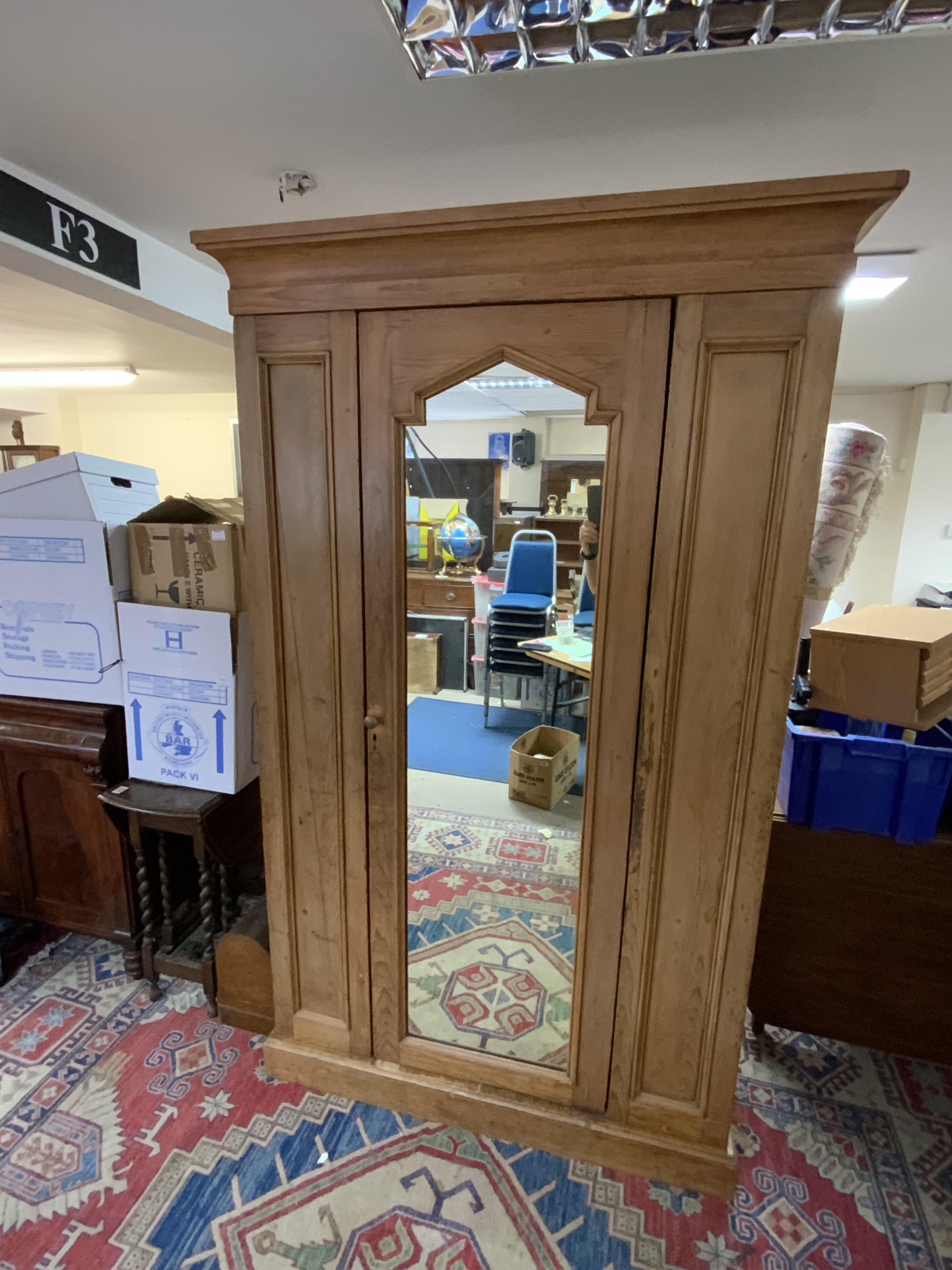 A Victorian mirrored front Pine wardrobe/hall-robe. 206cm x 126cm x 59.5cm.