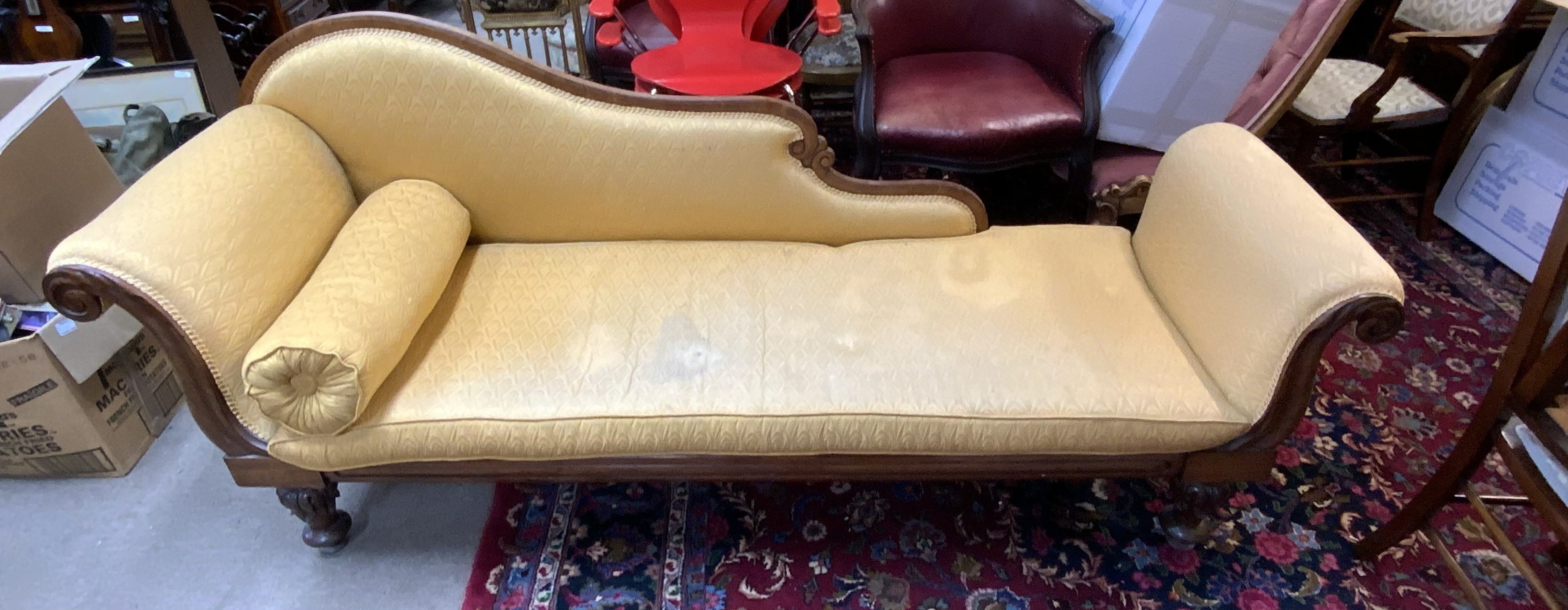 A 19thC mahogany veneered chaise lounge. 202cm x 90cm x 61cm