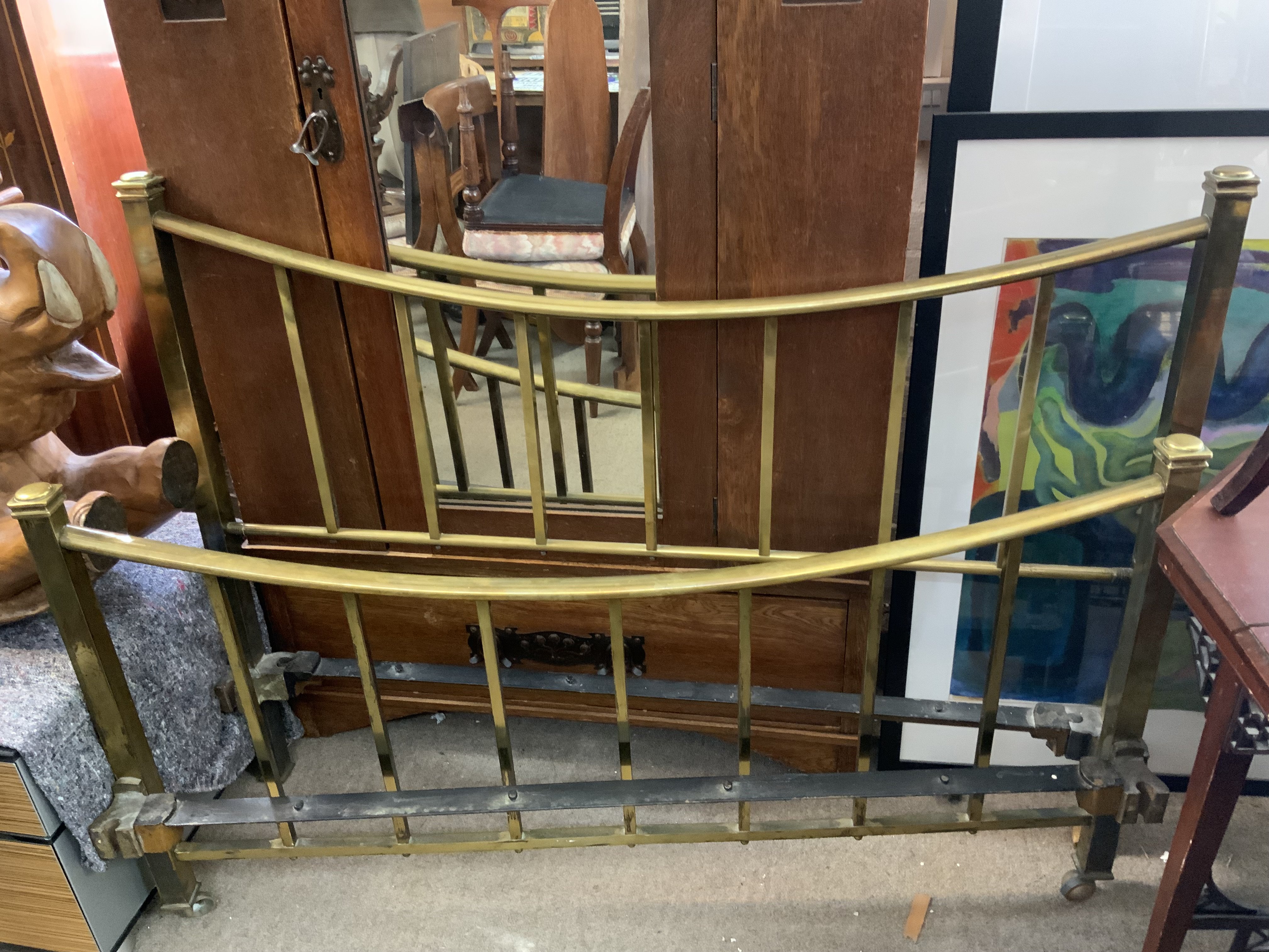 A Victorian brass bedstead,138cm wide.