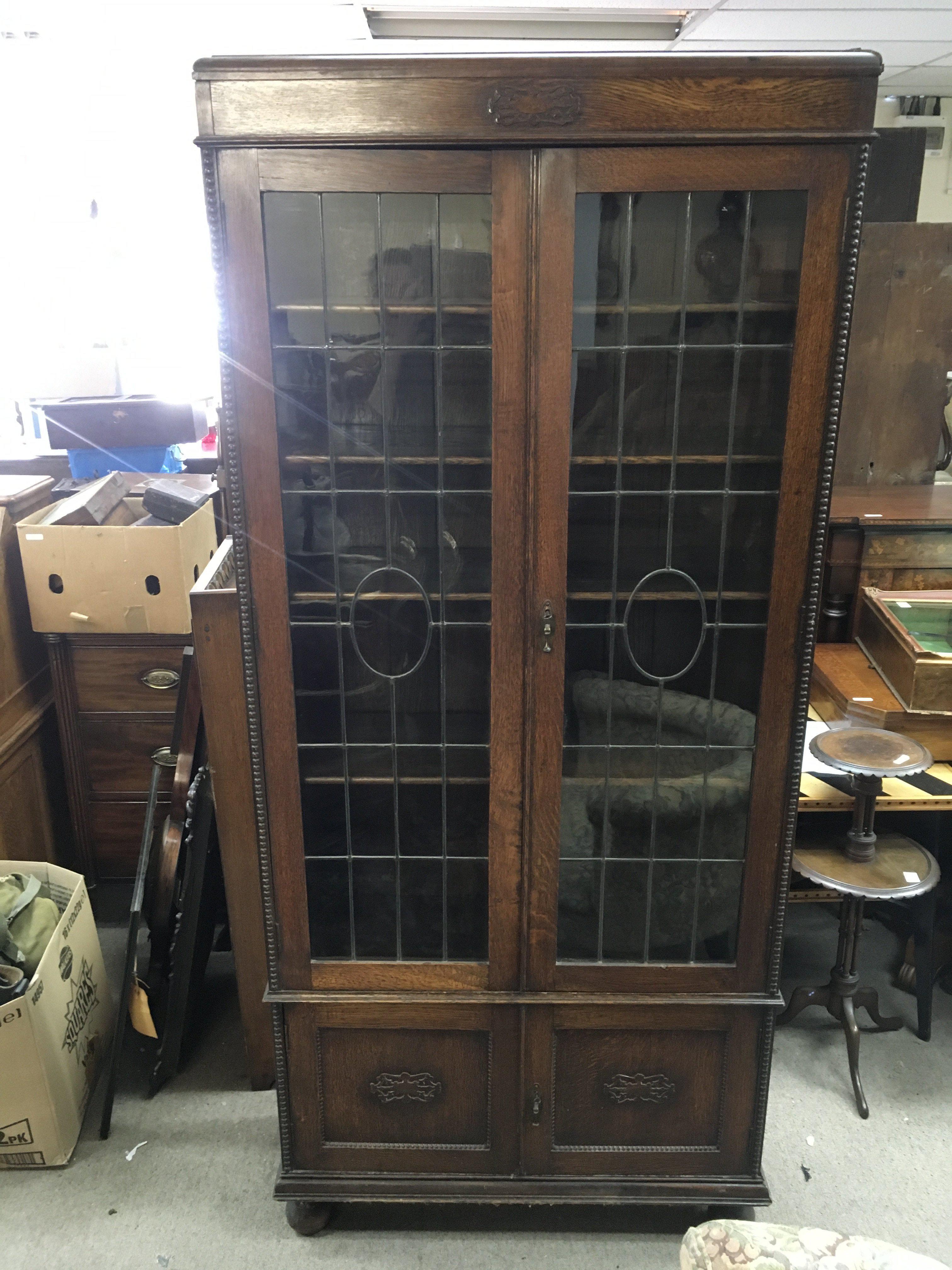 An oak bookcase . 84cm wide 190cm tall