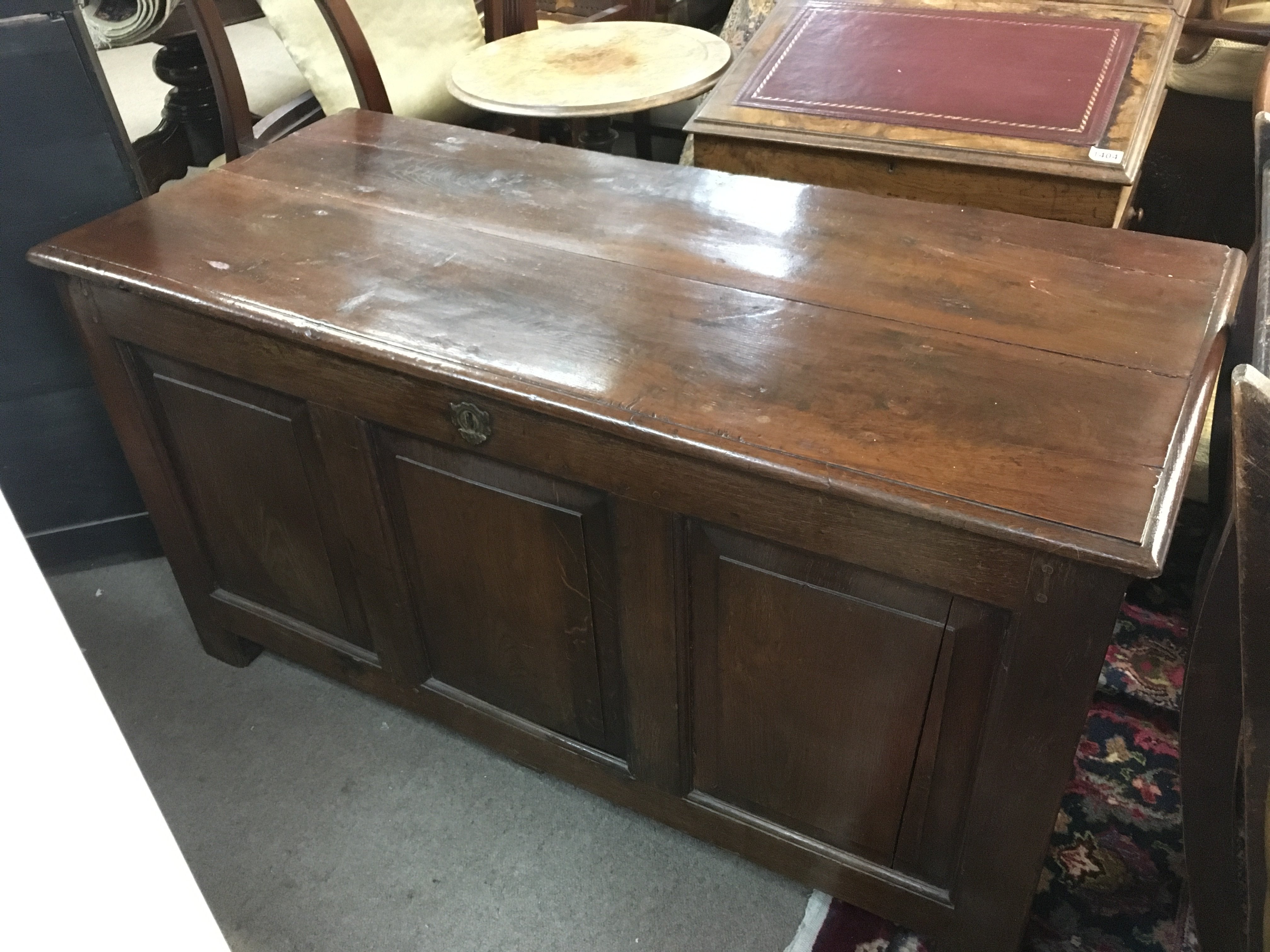 An 18th century oak chest 130cm wide 58cm long 70cm tall