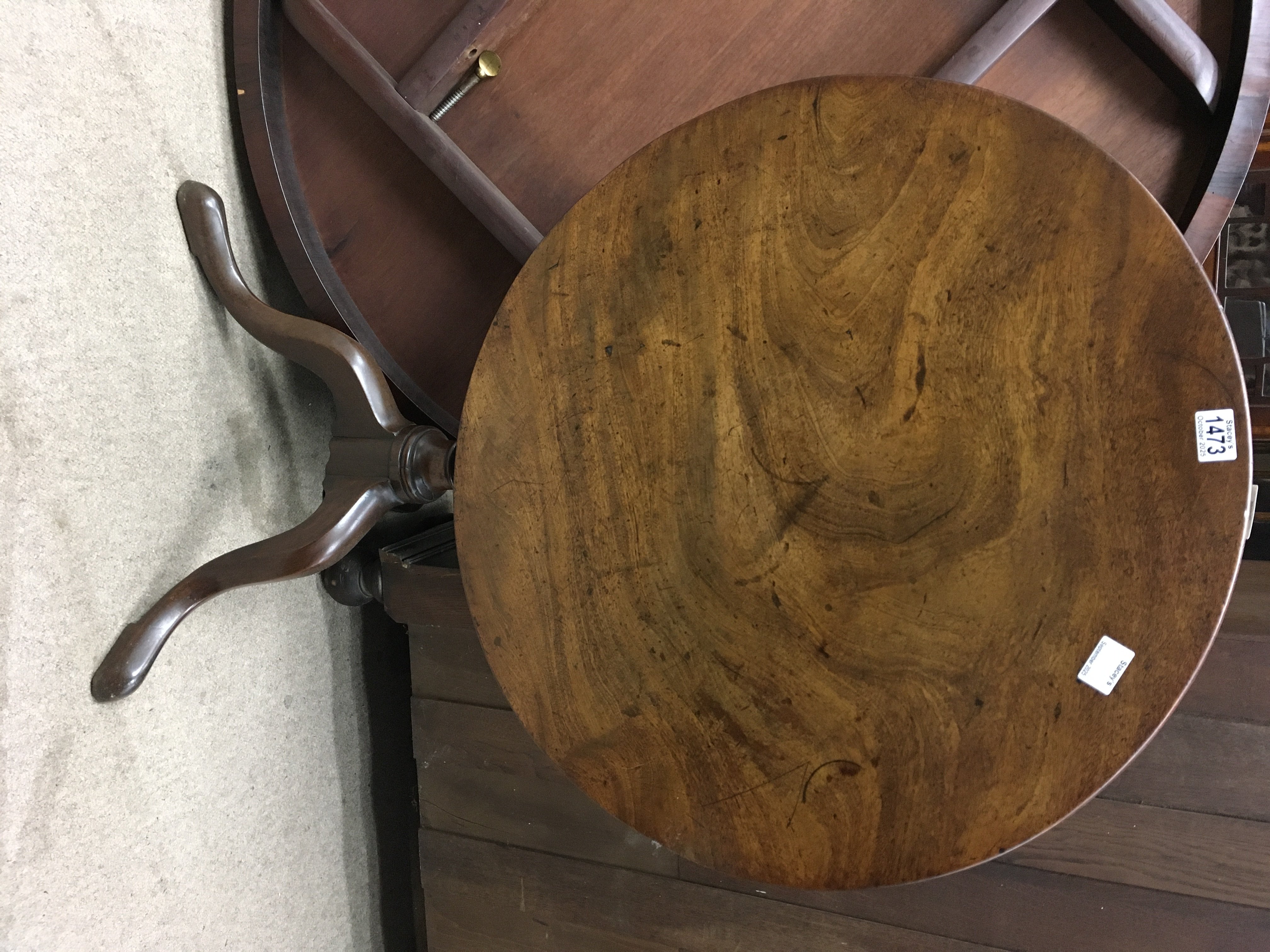 A Georgian mahogany tilt top occasional table, on tapering legs