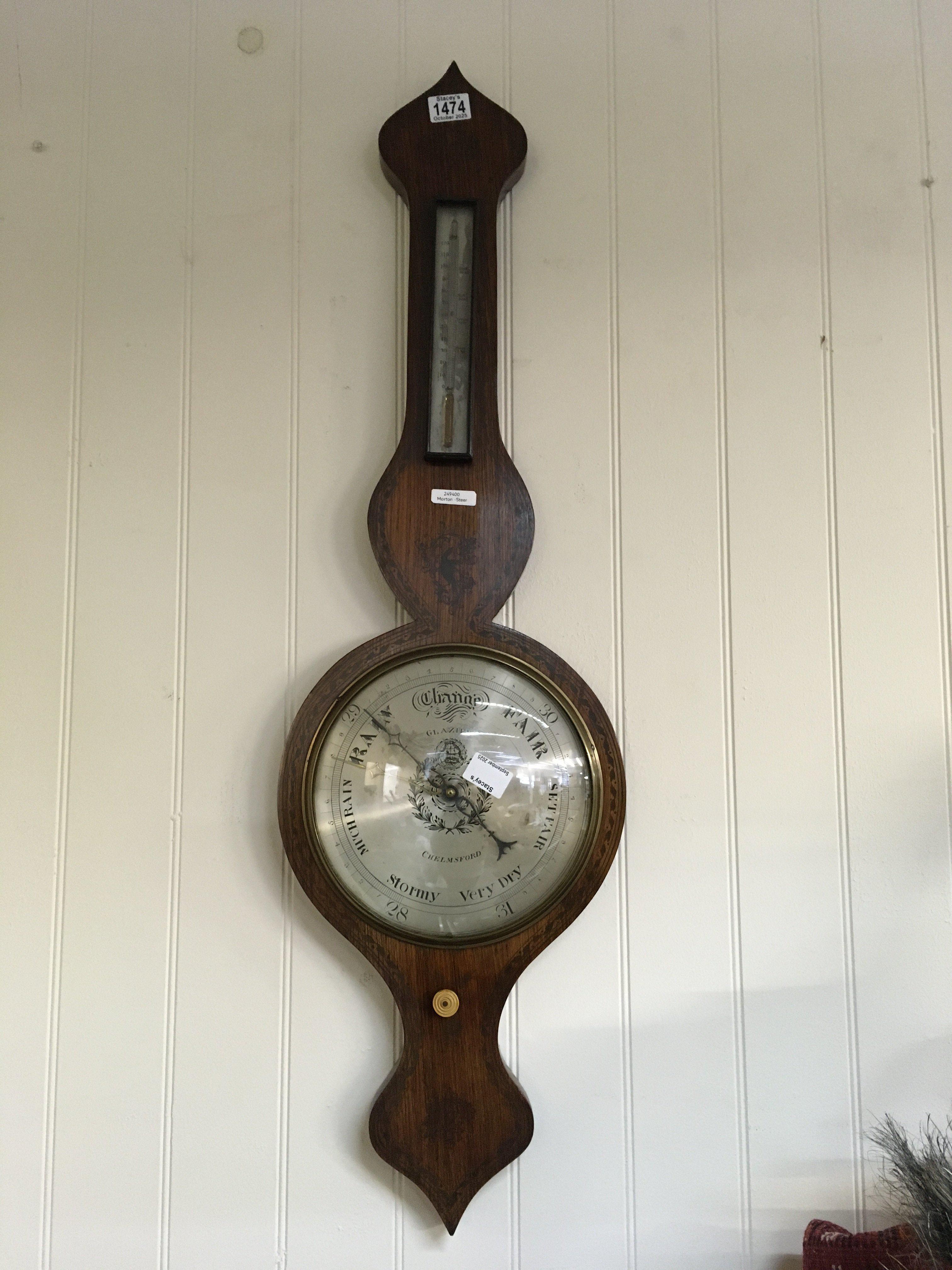 A Victorian rosewood barometer with brass inlay, with silver dial. Maker -Glazier Chelmsford