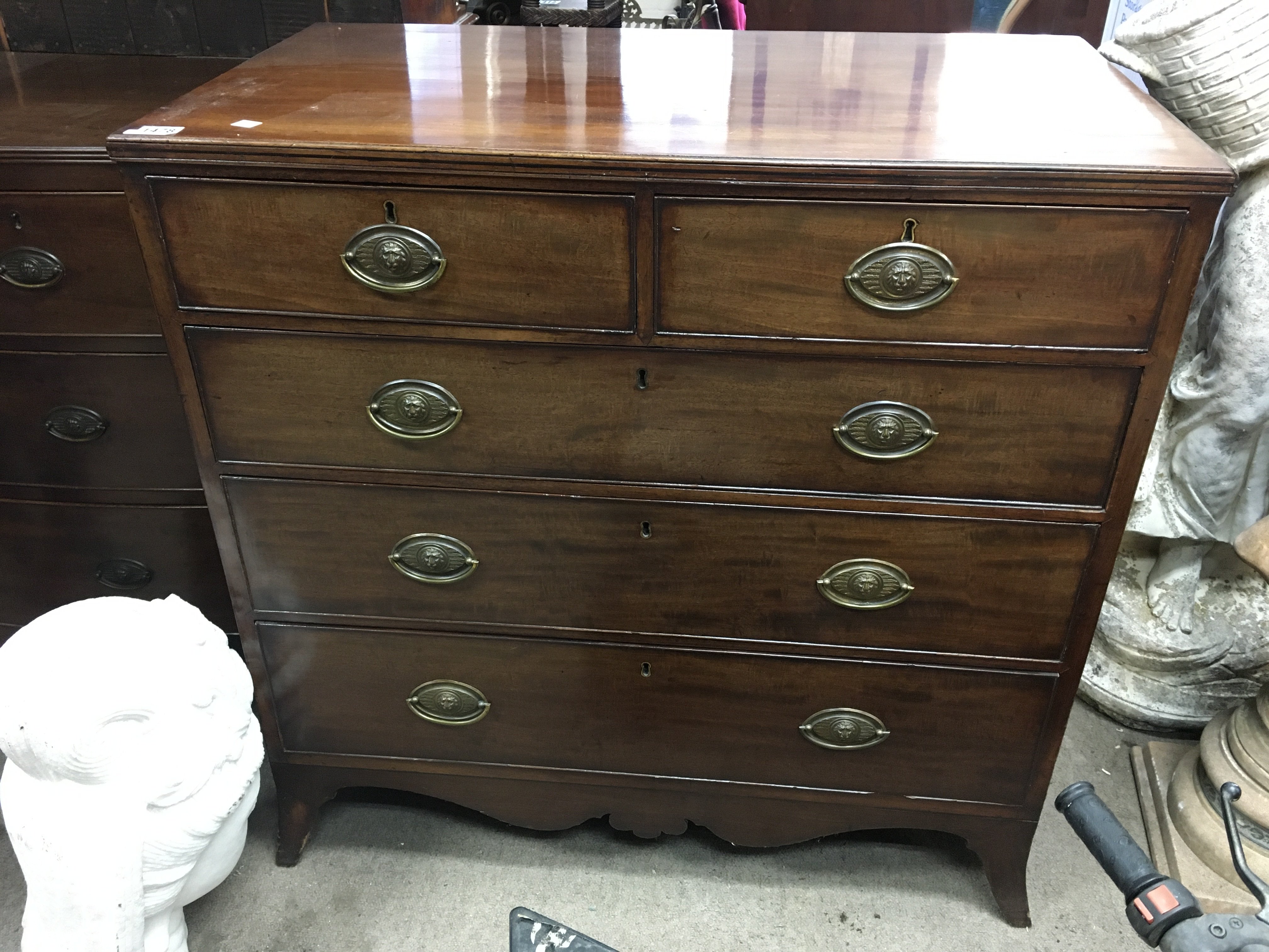 A Victorian mahogany chest of drawers fitted with two short and two long drawers