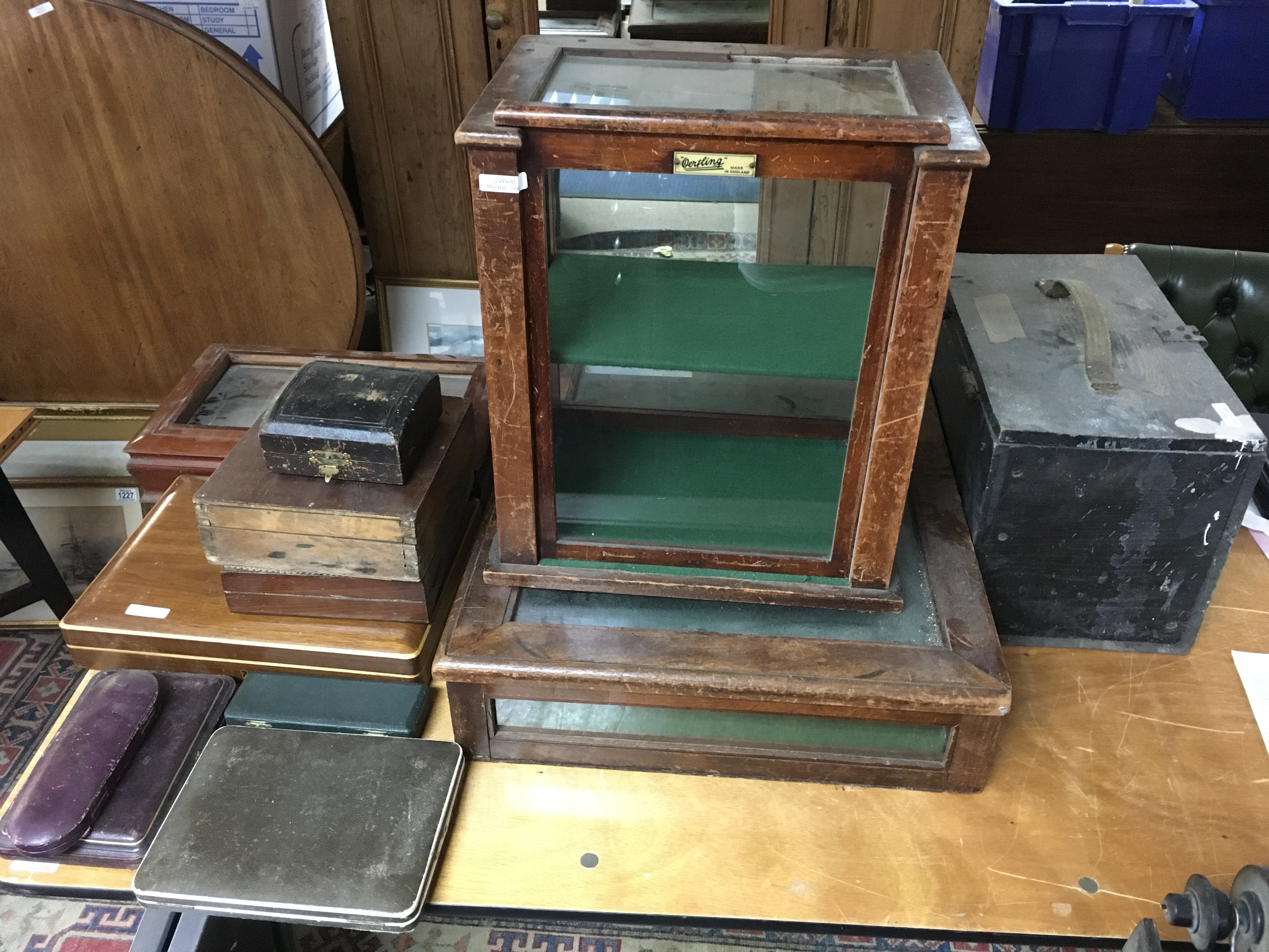 A table top cabinet together with empty cutlery cases and a small glazed cabinet with single shelf