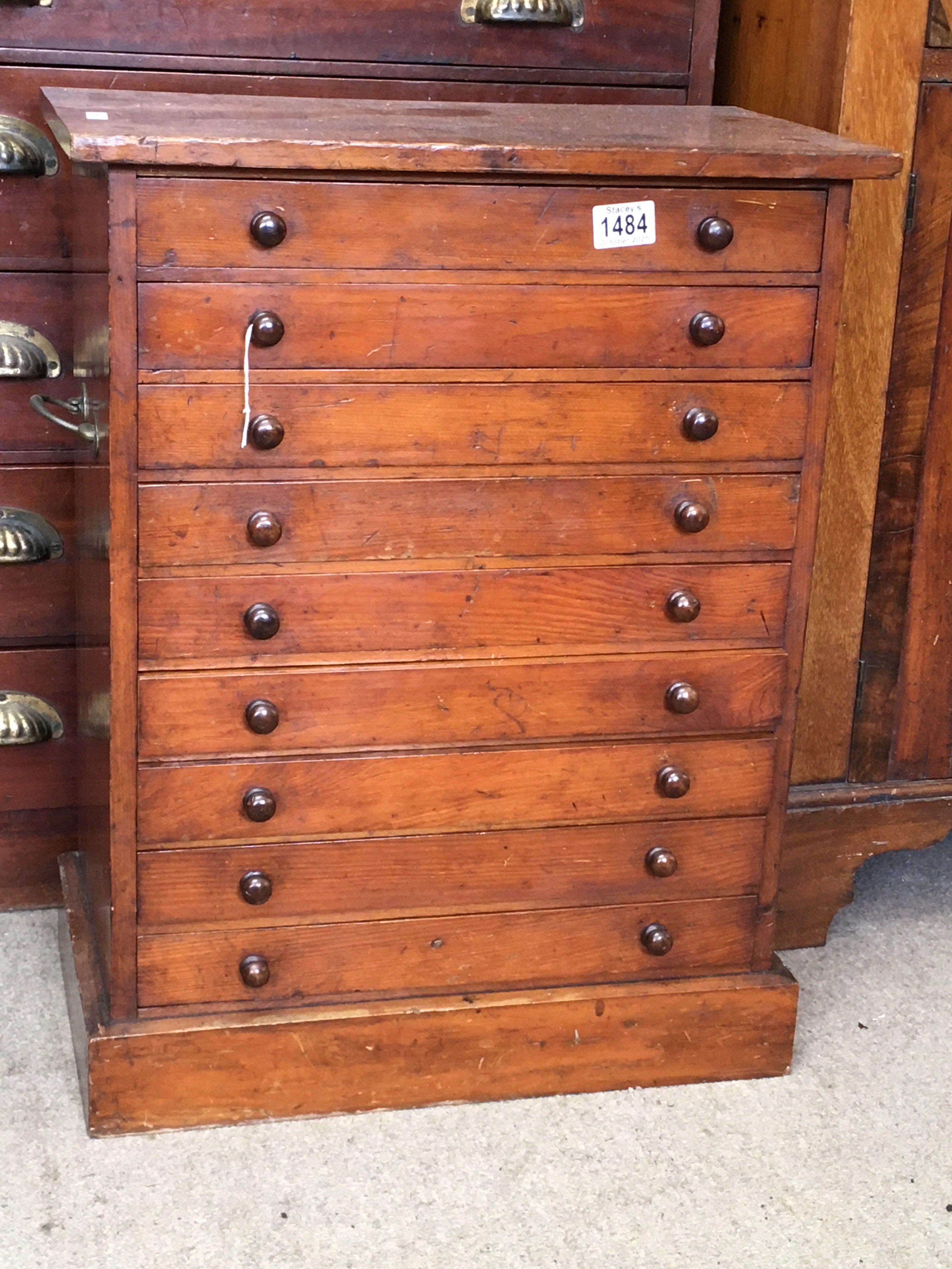 A mahogany collector&#2013266057۪s cabinet, fitted with 9 drawers, on a plinth base. 63cm x 50cm x 30cm
